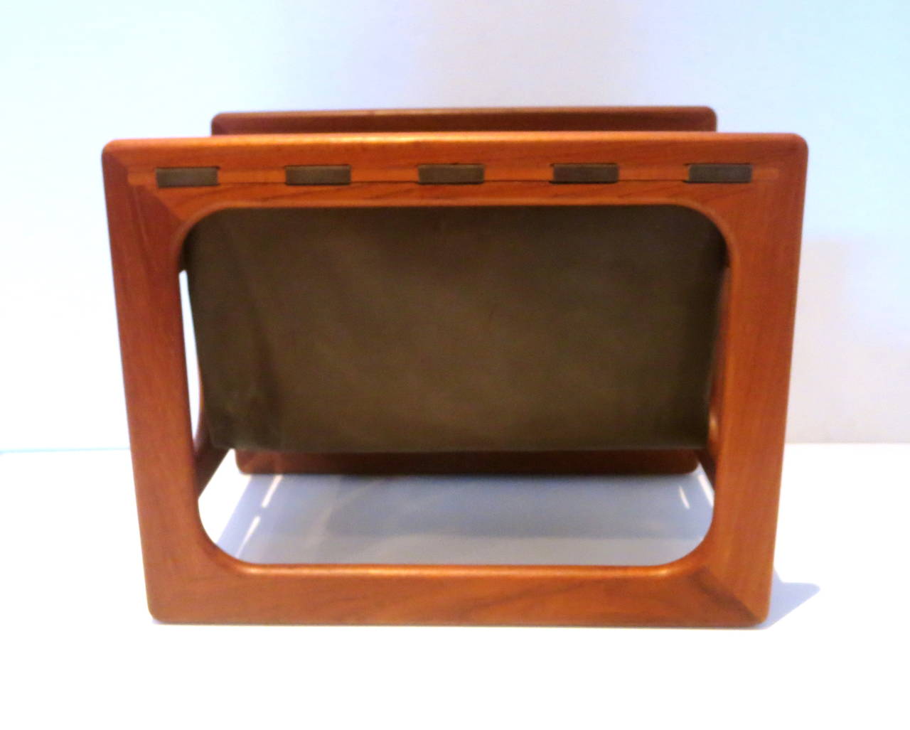 20th Century Danish Modern Leather and Teak Sculpted Double Magazine Rack For Sale