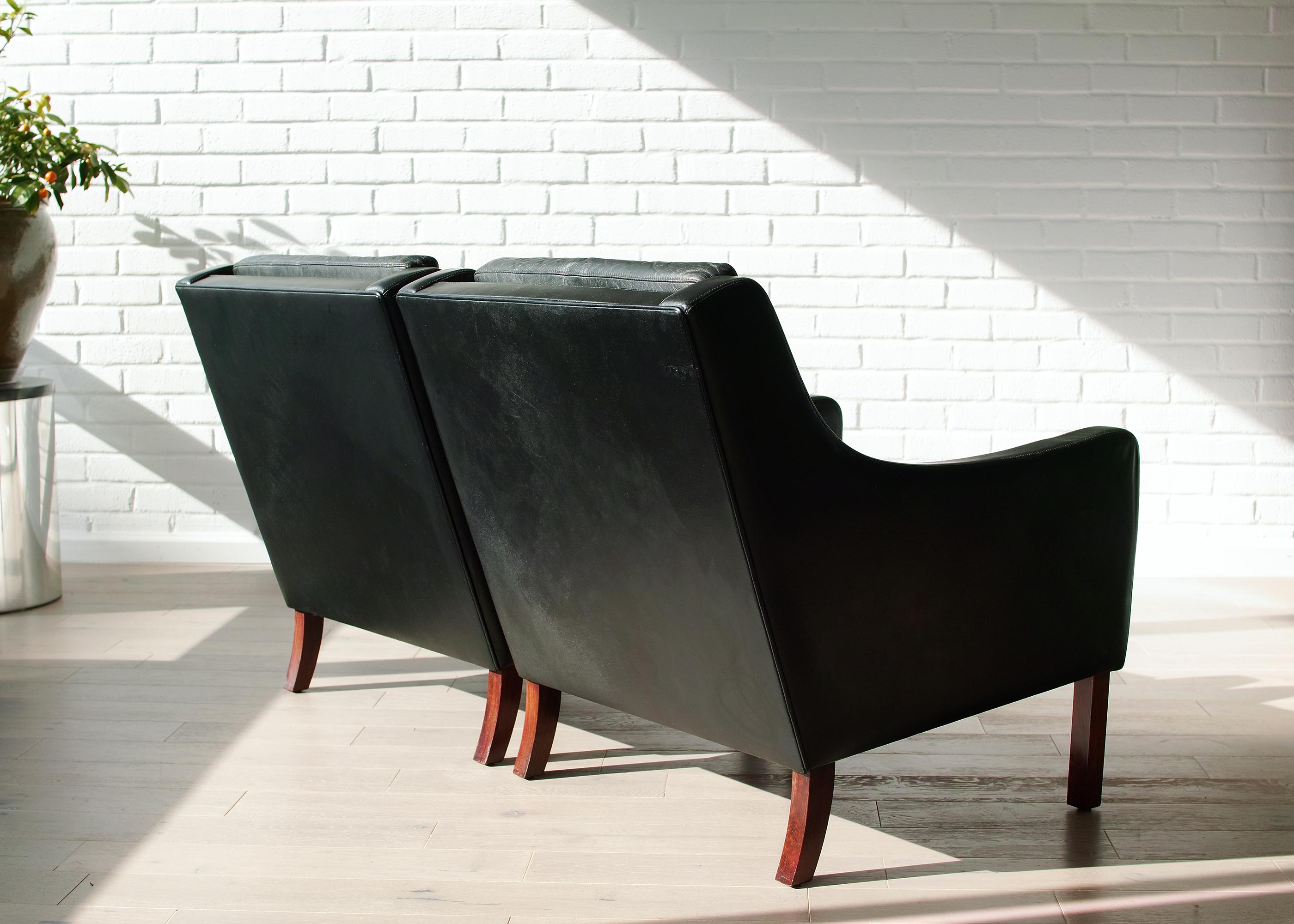 Scandinavo moderno Poltrone moderne danesi in pelle e palissandro in vendita