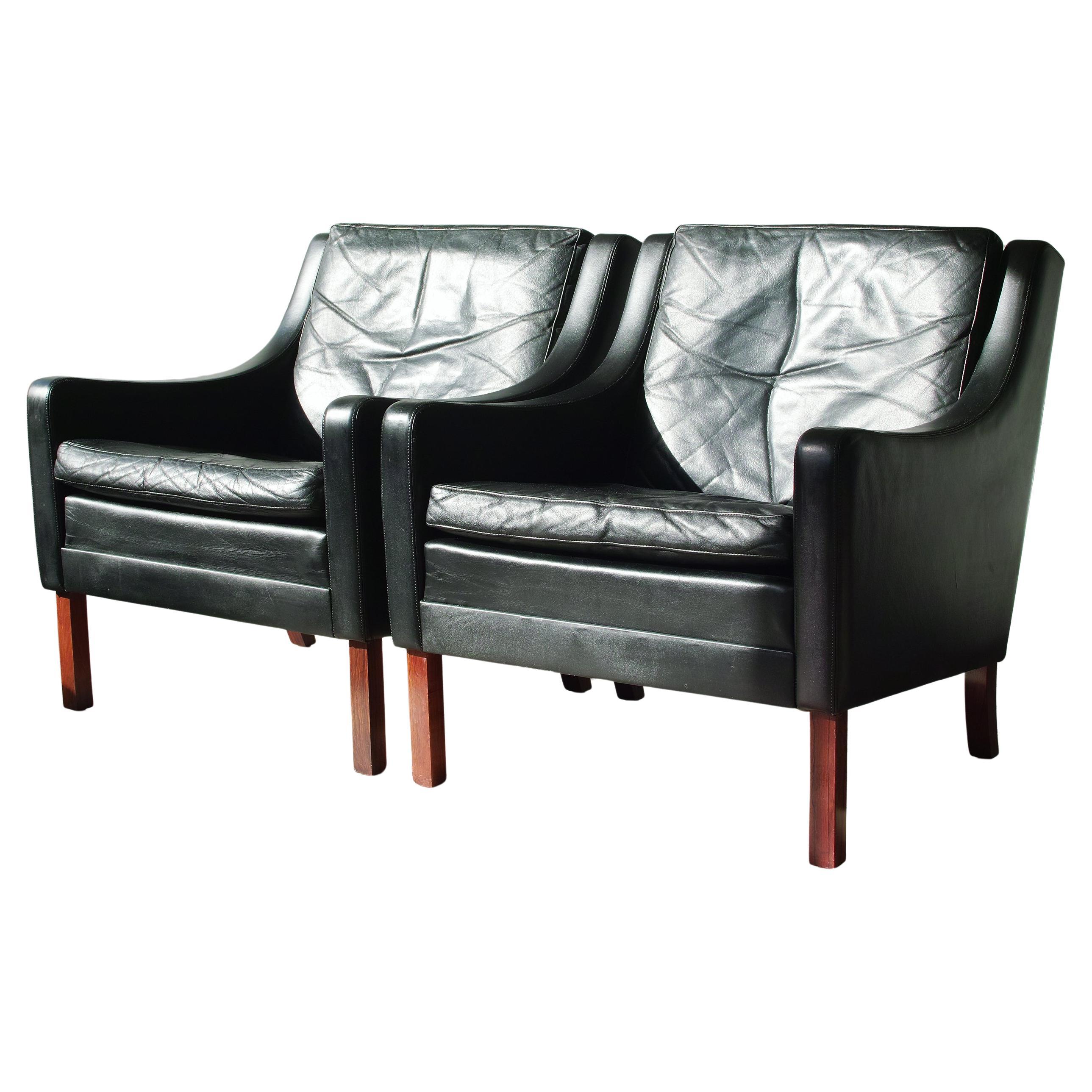 Poltrone moderne danesi in pelle e palissandro