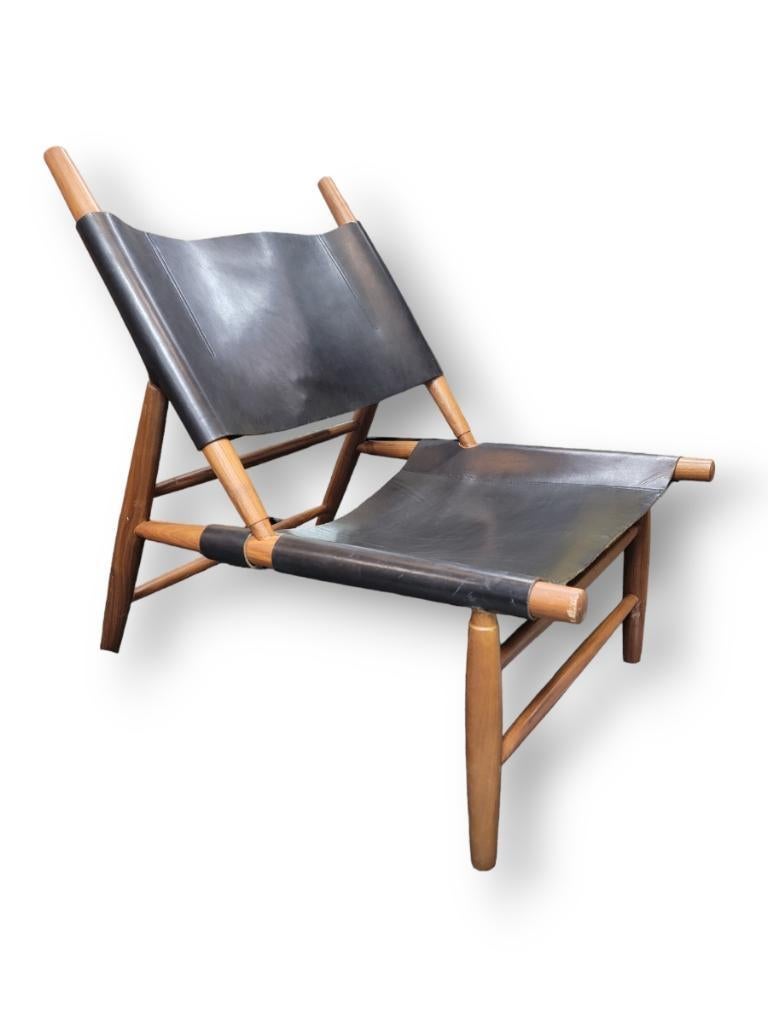Hand-Crafted Danish Modern Leather Walnut Framed Triangle Sling Chair by Vilhem Wohlert For Sale