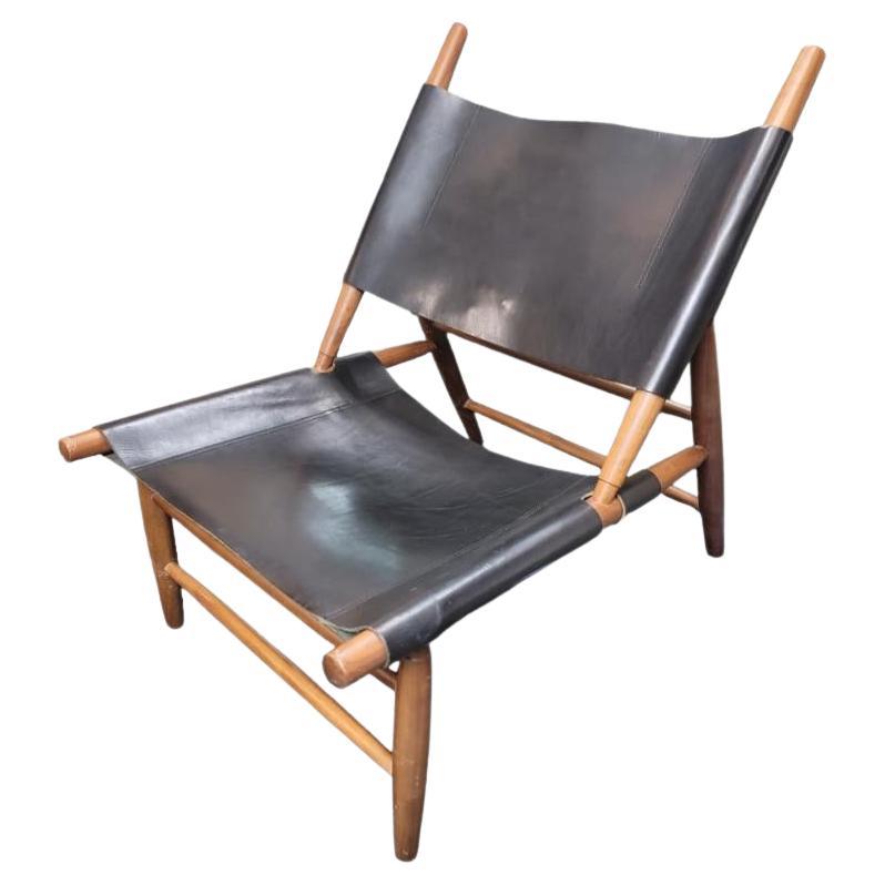 Danish Modern Leather Walnut Framed Triangle Sling Chair by Vilhem Wohlert For Sale