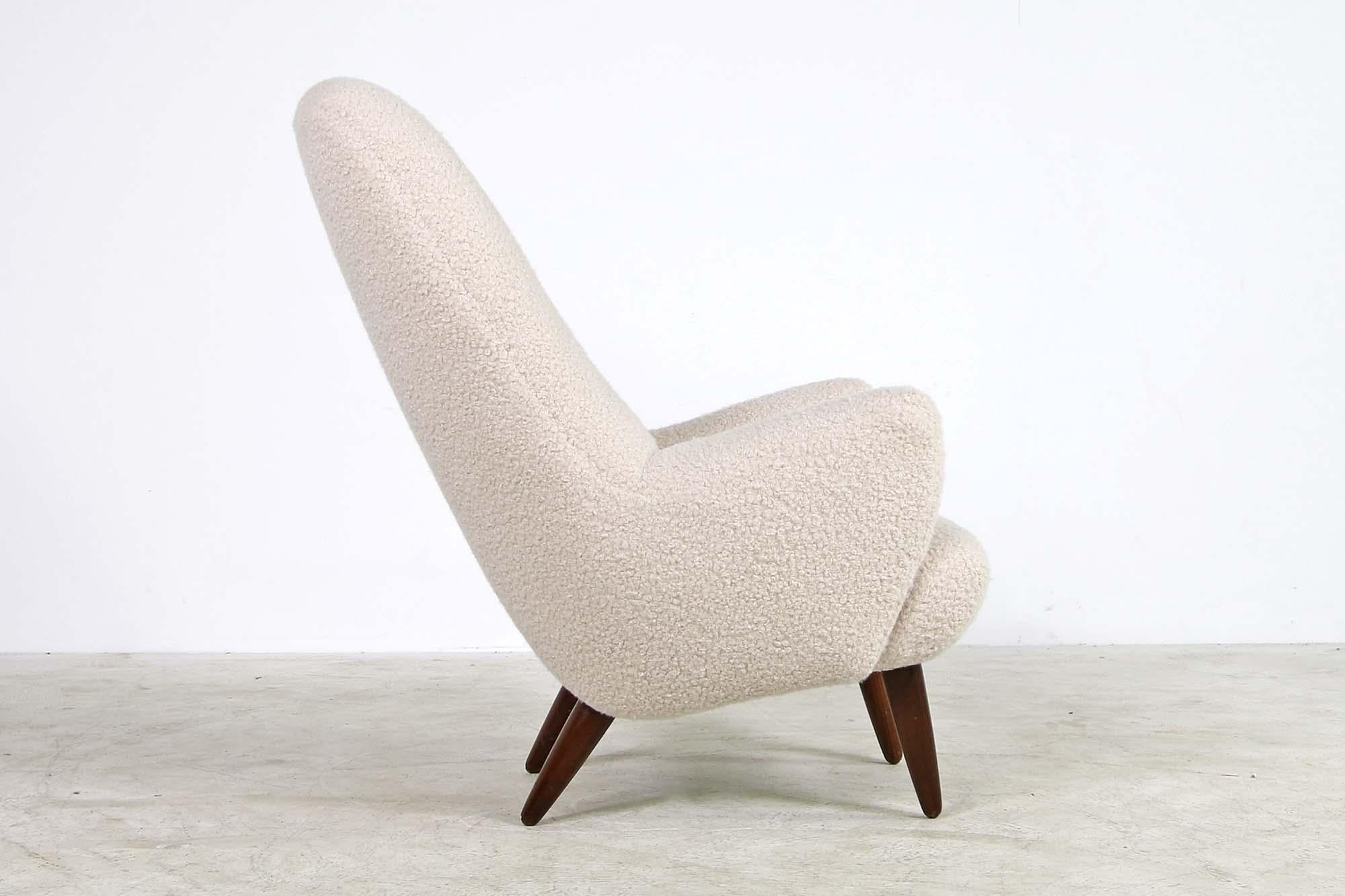 Very rare and beautiful Scandinavian midcentury highback lounge chair, produced by Gustav Thams, new upholstery and new fabric, teddy fur boucle fabric, super soft to the touch, tufted with leather buttons, super cozy.

Rare piece, dark brown