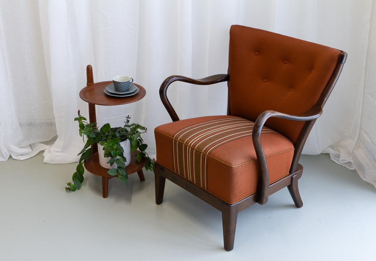 Danish Modern Lounge Chair by Alfred Christensen for Slagelse Møbelværk, 1940s.
Early Mid-Century Modern Danish armchair / easy chair from the 1940s by Alfred Christensen for Slagelse Møbelværk, Denmark.
Frame in stained beech. Wide curved back with