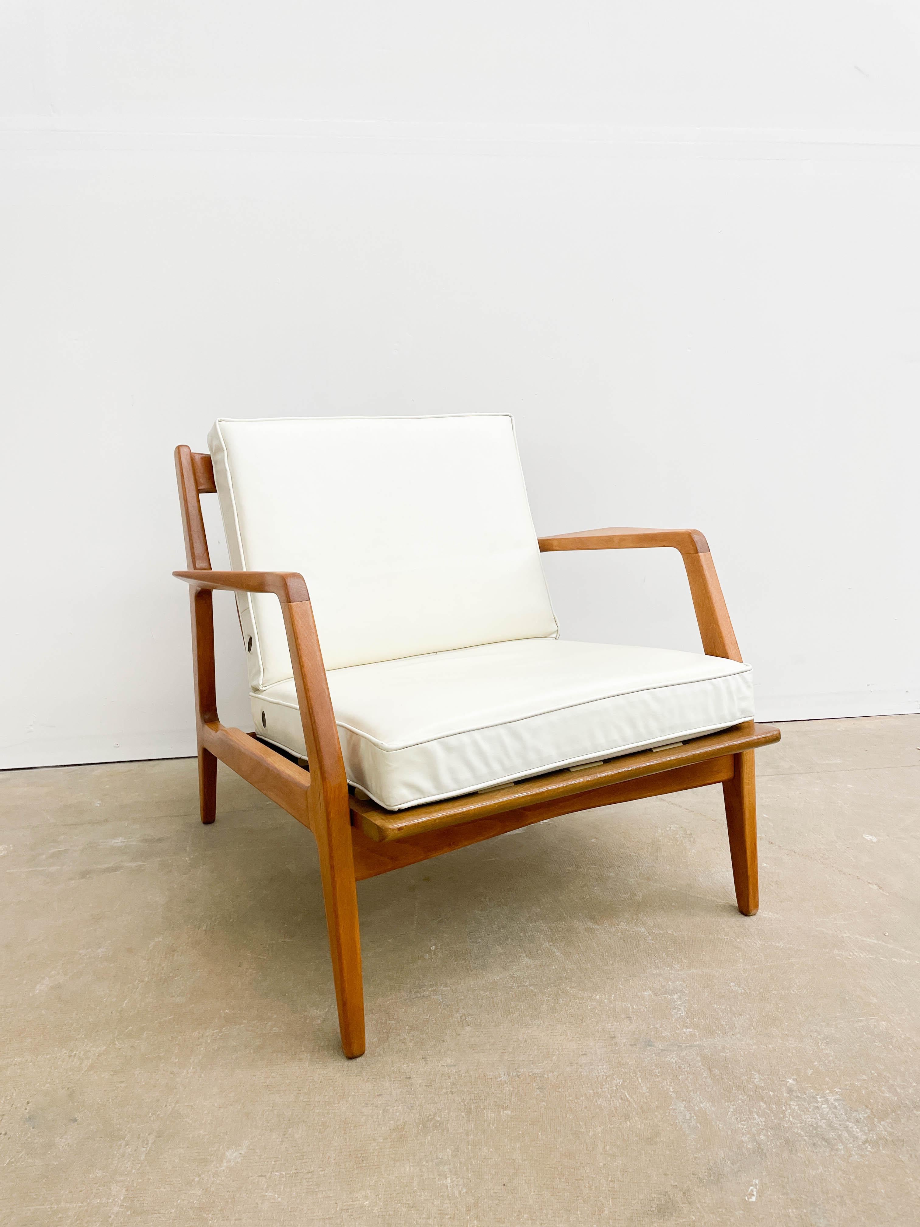 This is an archetypal Danish Modern lounge chair designed by Lawrence Peabody for Selig. Crafted in Denmark in the 1950s, the chair is made from beautiful beech wood. This chair was the most successful design that Lawrence Peabody made for Selig