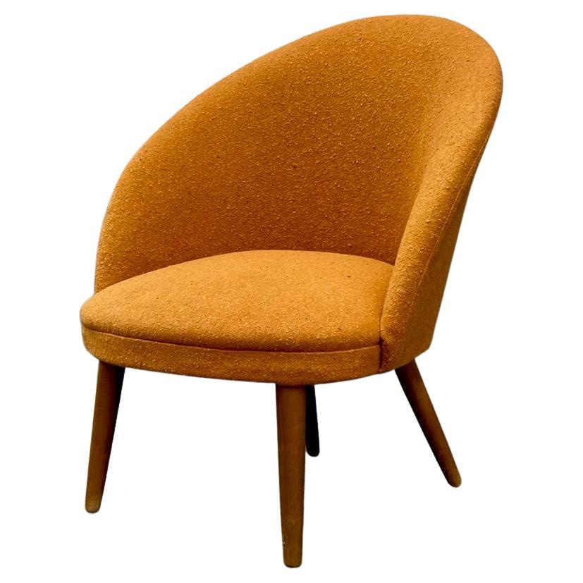 Dänischer moderner dänischer Sessel aus orangefarbener Wolle und Teakholz, 1960er Jahre