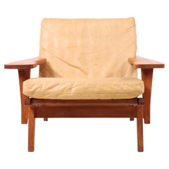 Danish Modern Lounge Chair in Patinated Leather by Hans Wegner by GETAMA, 1970