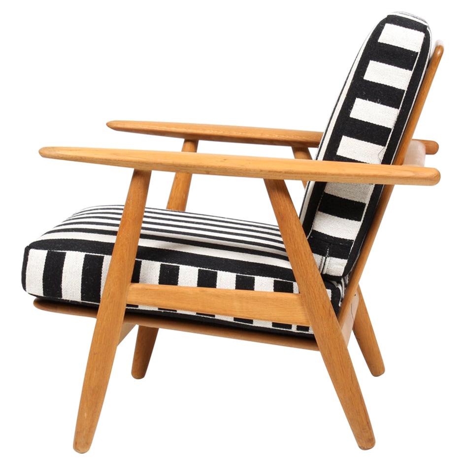 Danish Modern Lounge Chair in Patinated Oak by Hans Wegner by GETAMA, 1950