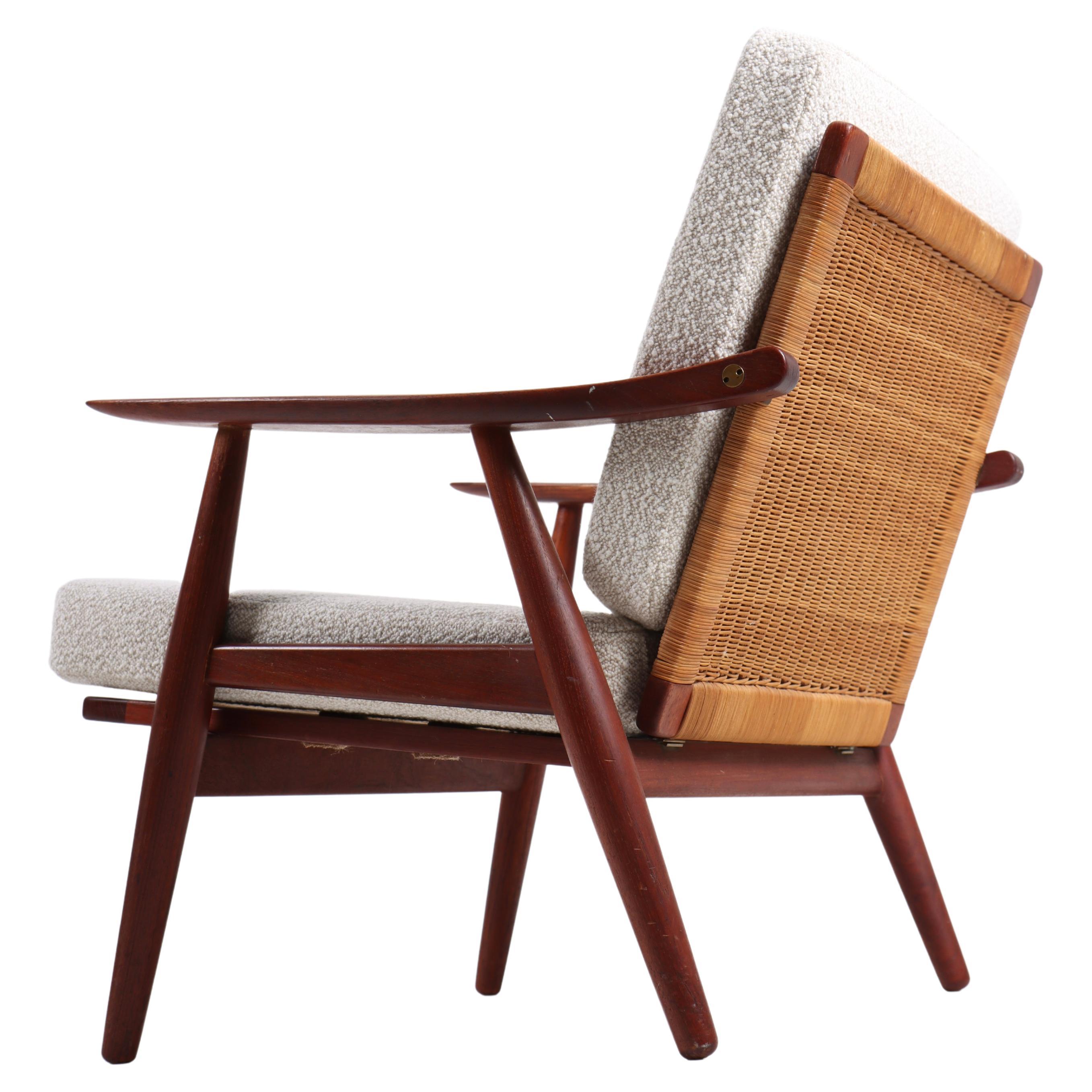 Scandinavian Modern Danish Modern Lounge Chair in Teak and Cane by Hans Wegner by GETAMA, 1950