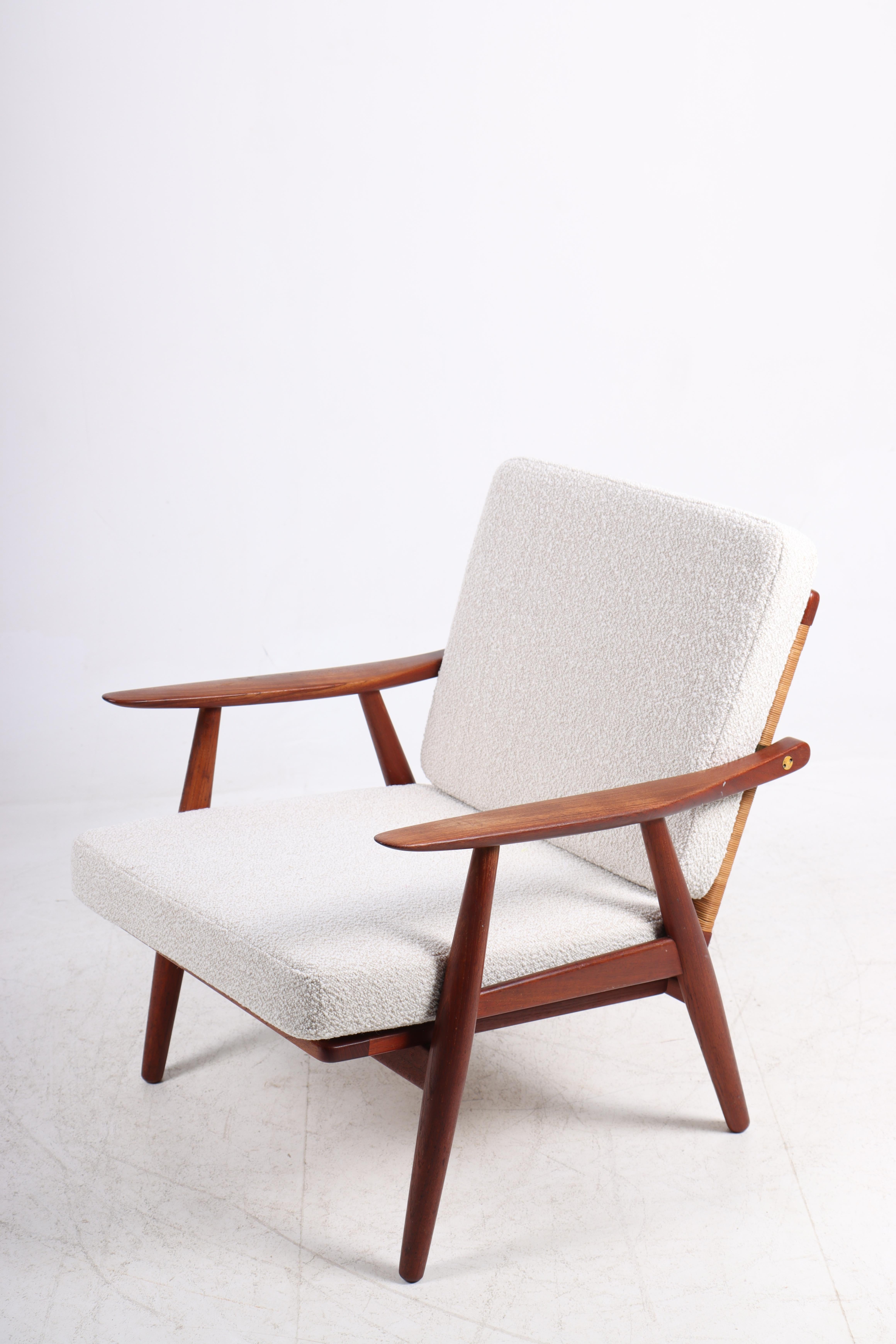 Mid-20th Century Danish Modern Lounge Chair in Teak and Cane by Hans Wegner by GETAMA, 1950