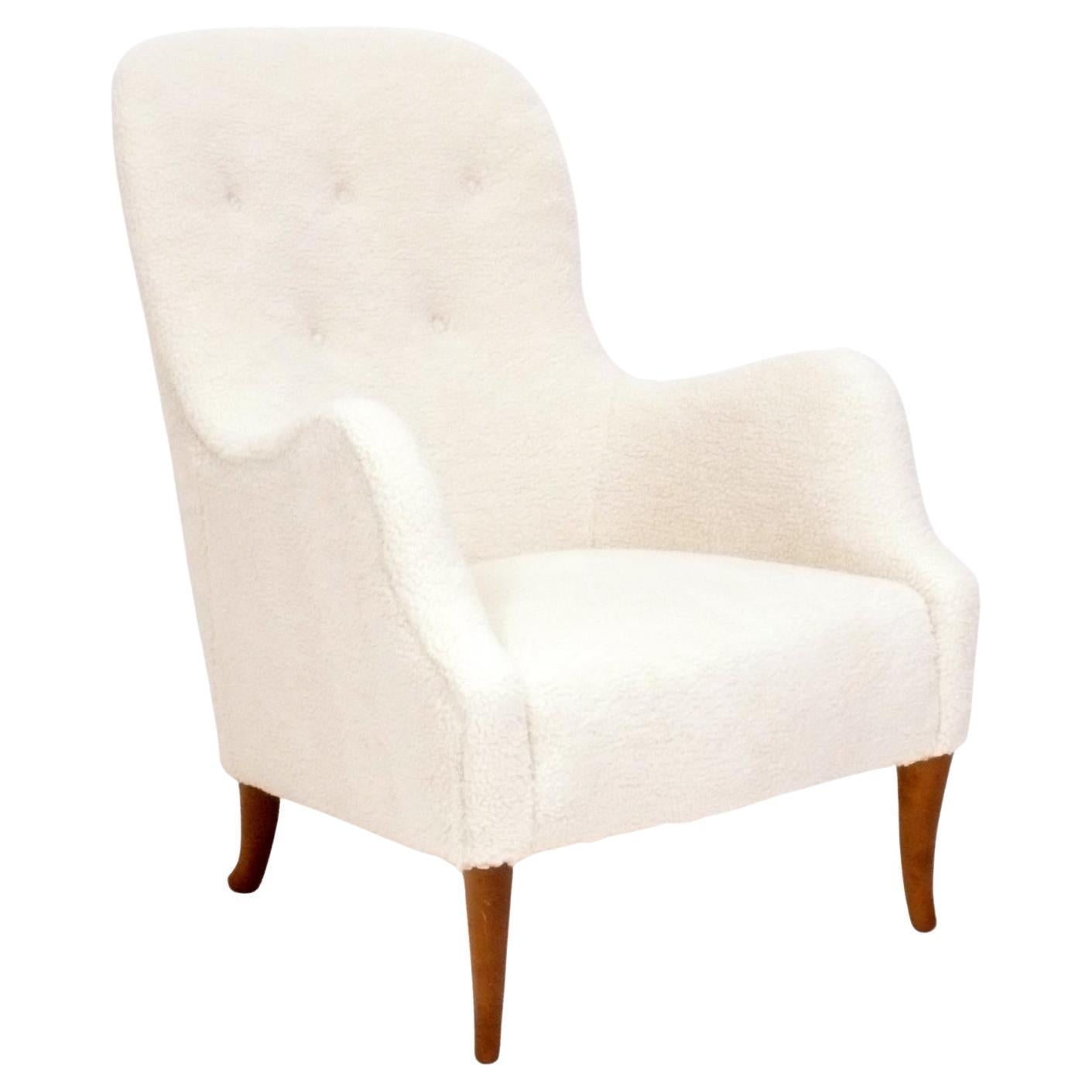 Danish Modern Lounge Chair Upholstered in Faux Sheepskin For Sale
