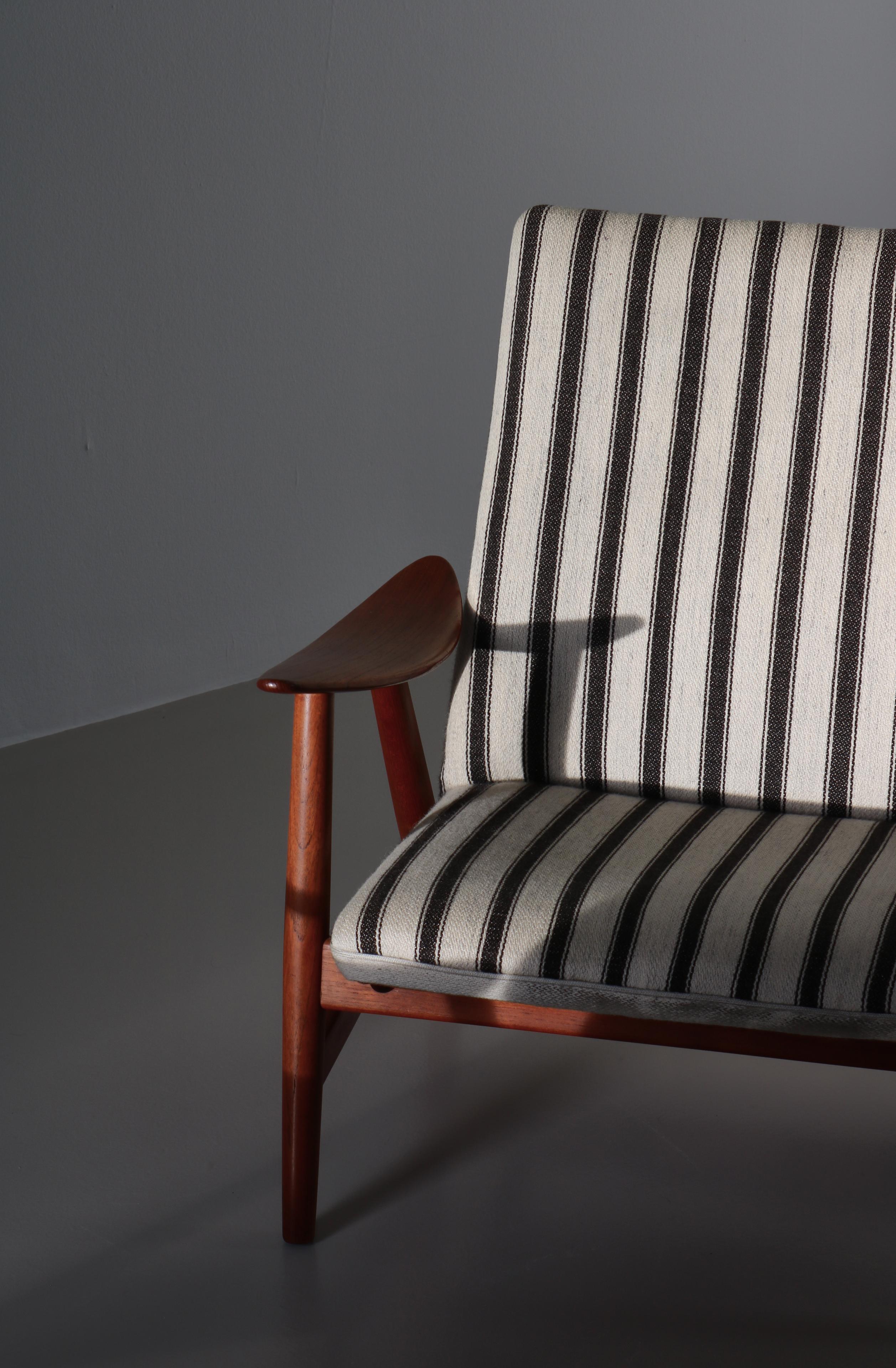 Teak Danish Modern Lounge Chairs by Illum Wikkelsø made at Søren Willadsen, 1950s For Sale