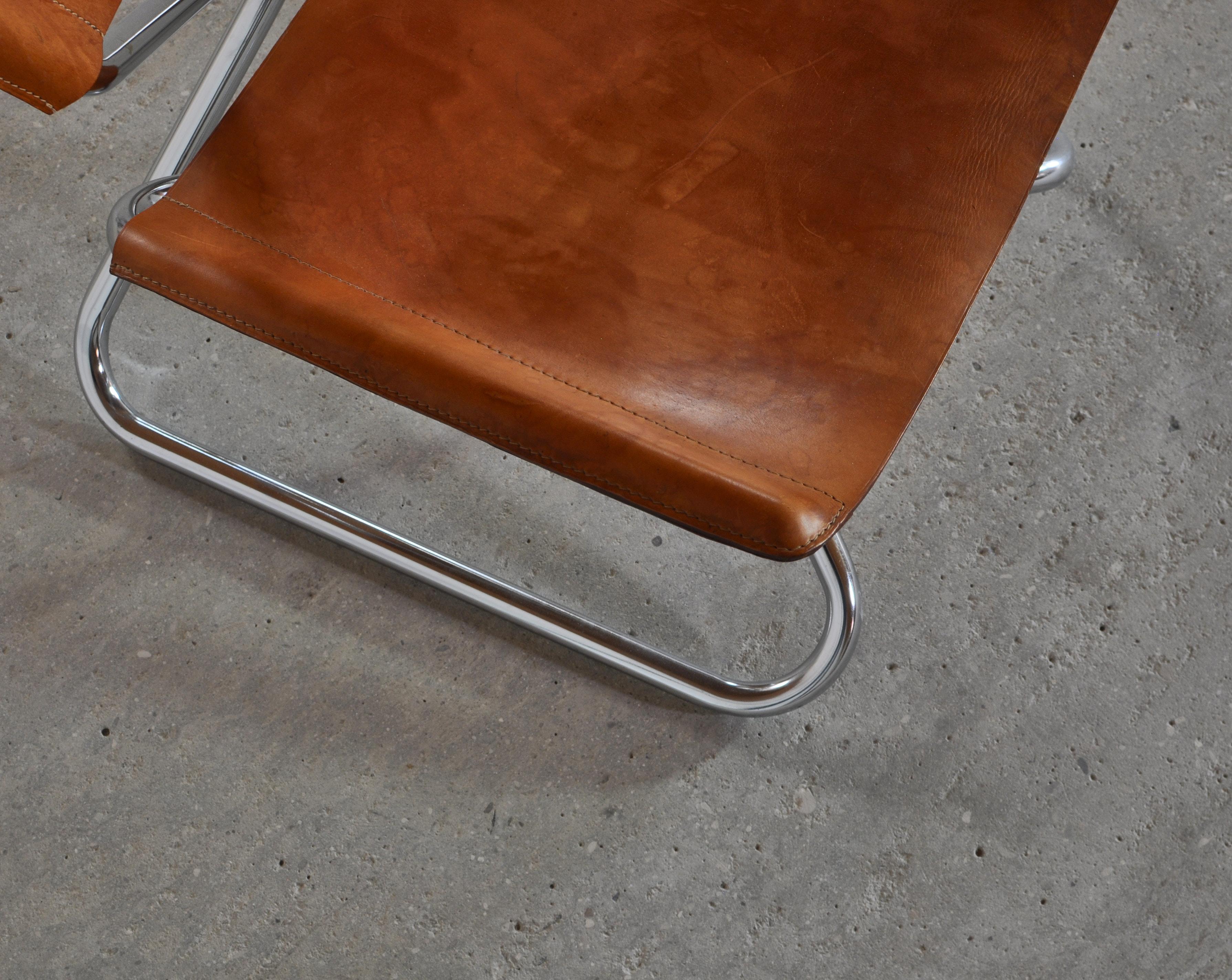 Danish Modern Lounge Chairs in Saddle Leather and Steel by Erik Magnussen 1