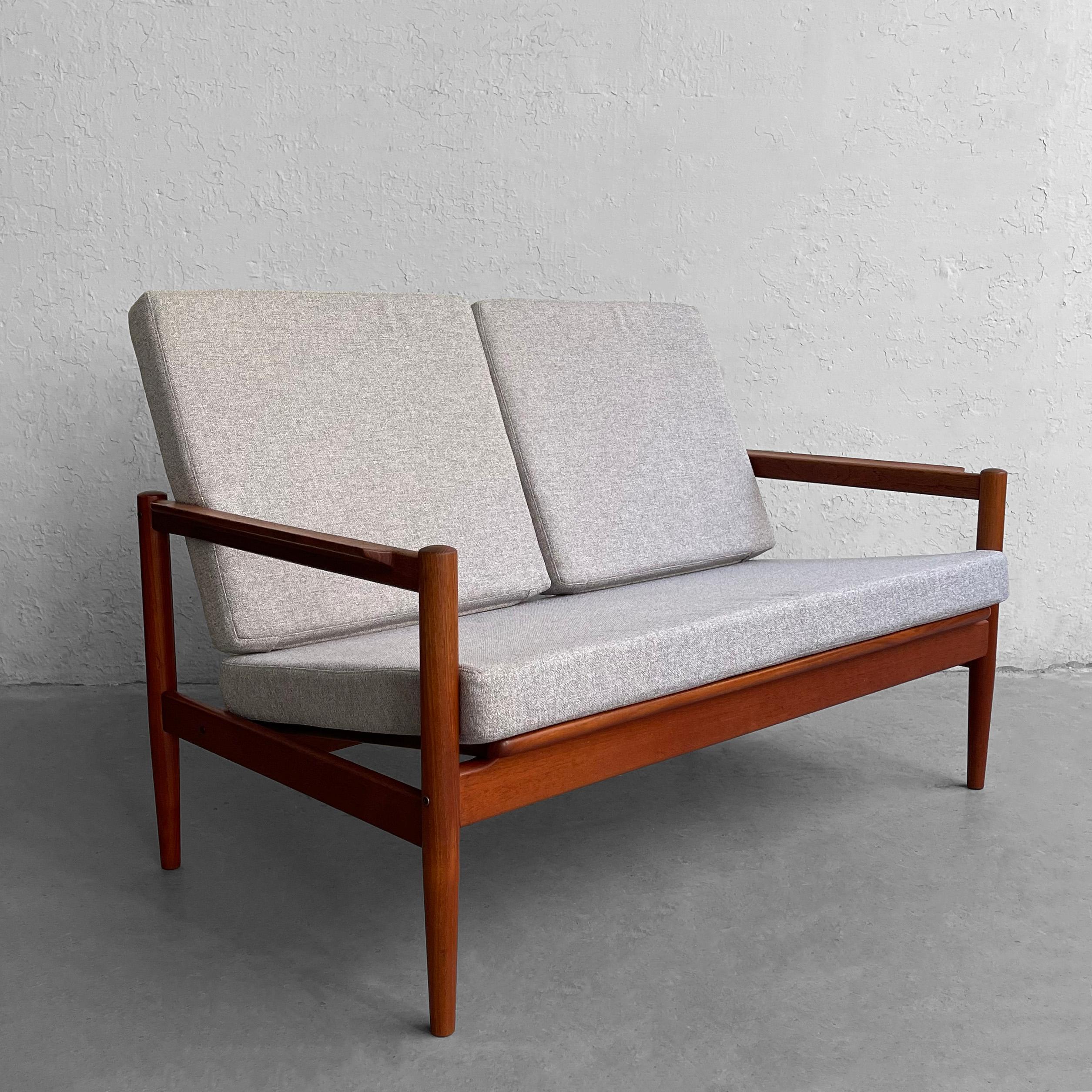 Danish modern, loveseat sette by Borge Jensen, Borge Jensen & Sonner features a teak frame with slat back, newly upholstered in light gray, cotton linen weave blend.