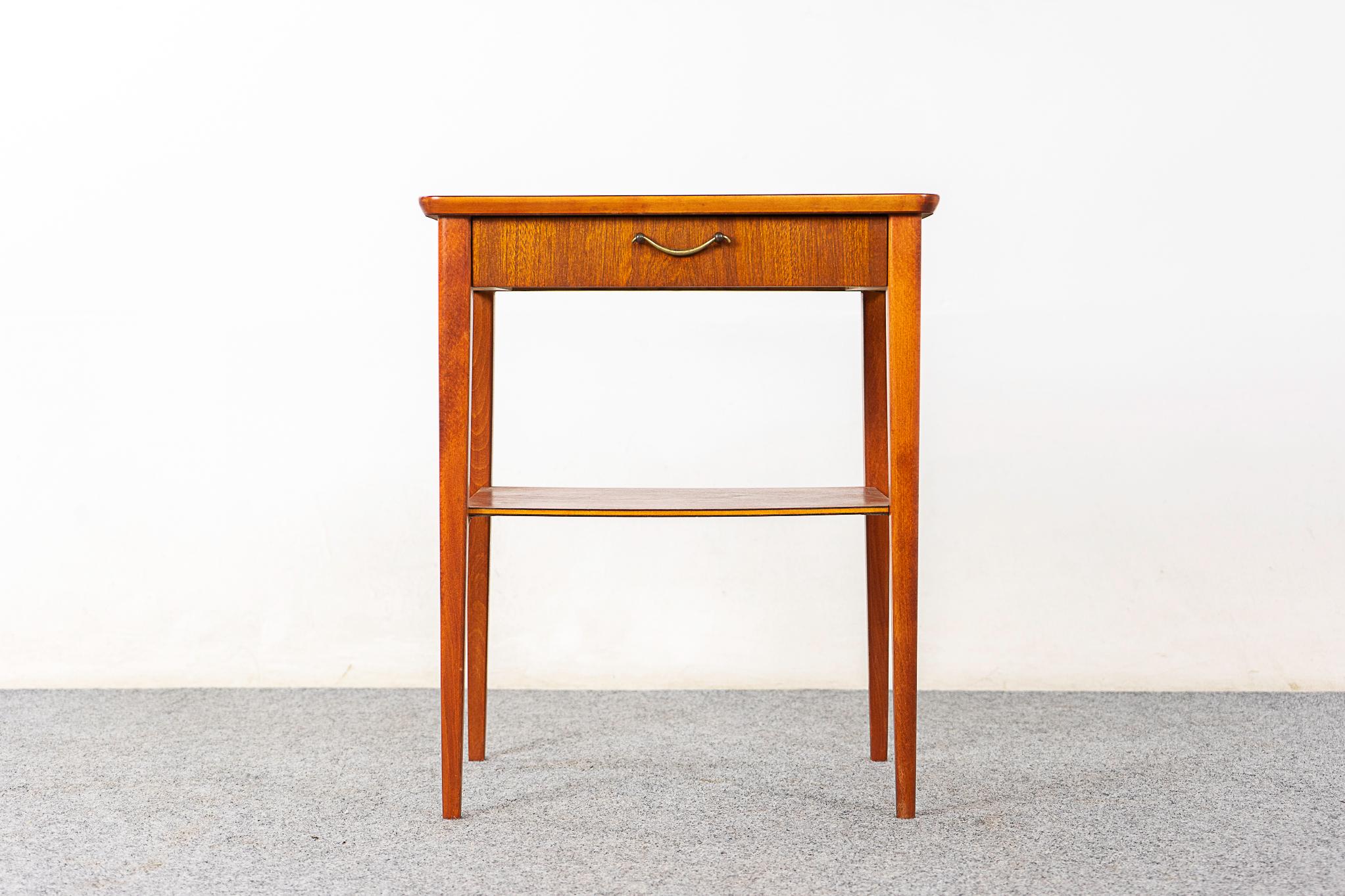 Mahogany Mid-century bedside tables, circa 1960s. Single dovetailed drawer for small essentials, lower shelf is perfect for your book on the go!

Unrestored item with option to purchase in restored condition for an additional $100 USD. Restoration