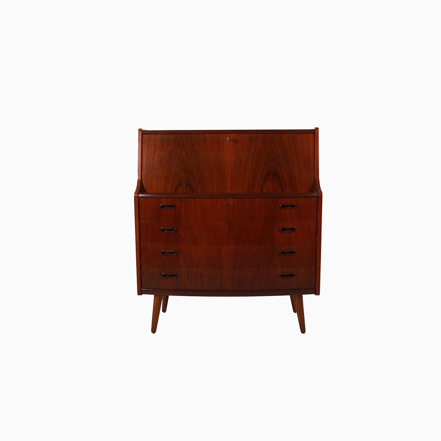 This elegant secretary desk is made from Cuban mahogany, which tends to have a honey colored appearance compared to more ubiquitous forms of the wood.  It would be well placed in an airy foyer or guest suite, or in a diminutive study situation.  