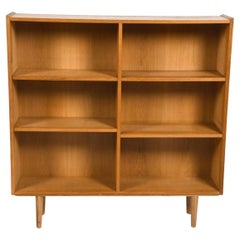 Danish Modern Mid century oak Bookcase with shelves on tapered legs