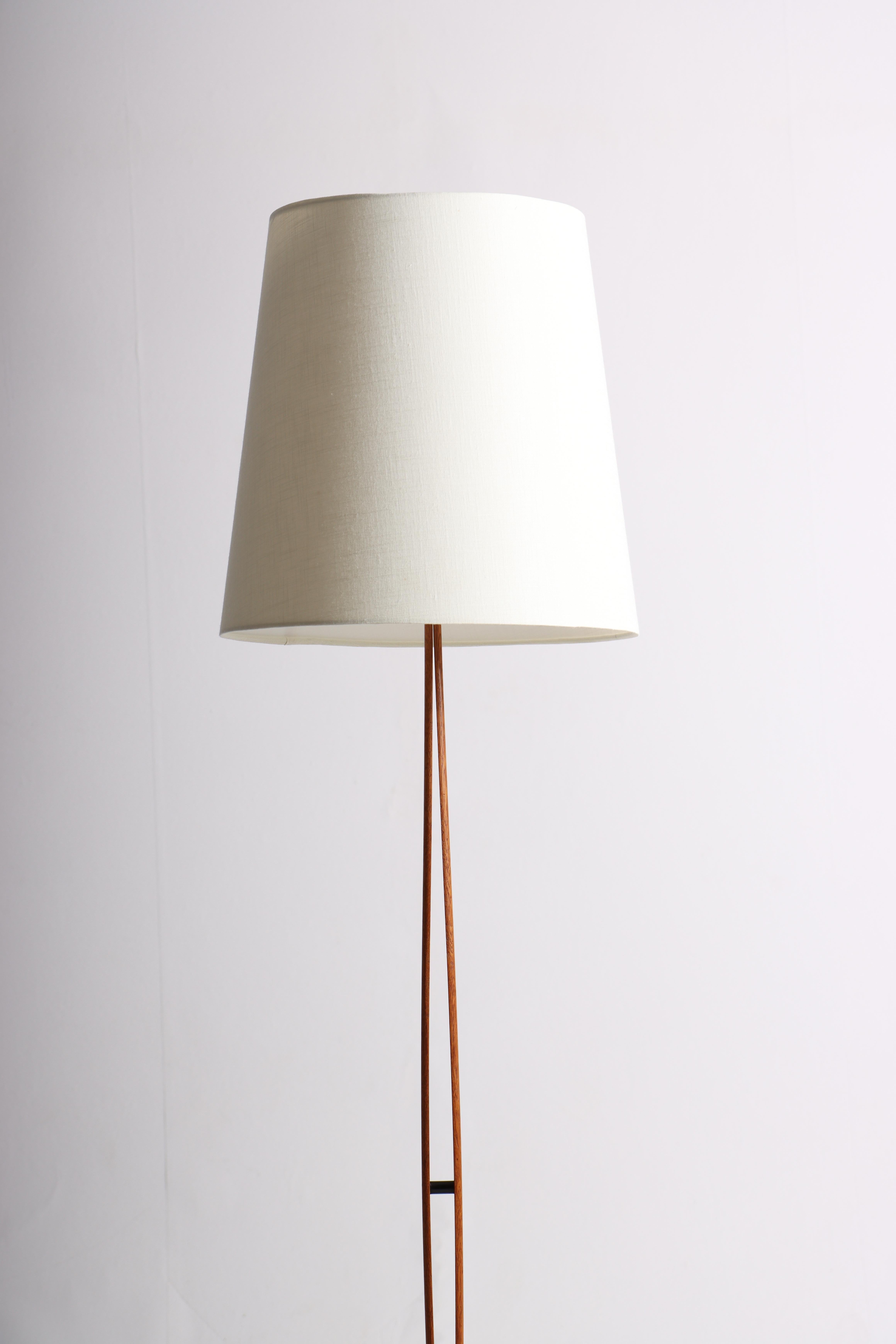 Great looking floor lamp in oak and new fabric shade. Designed and made in Denmark.
