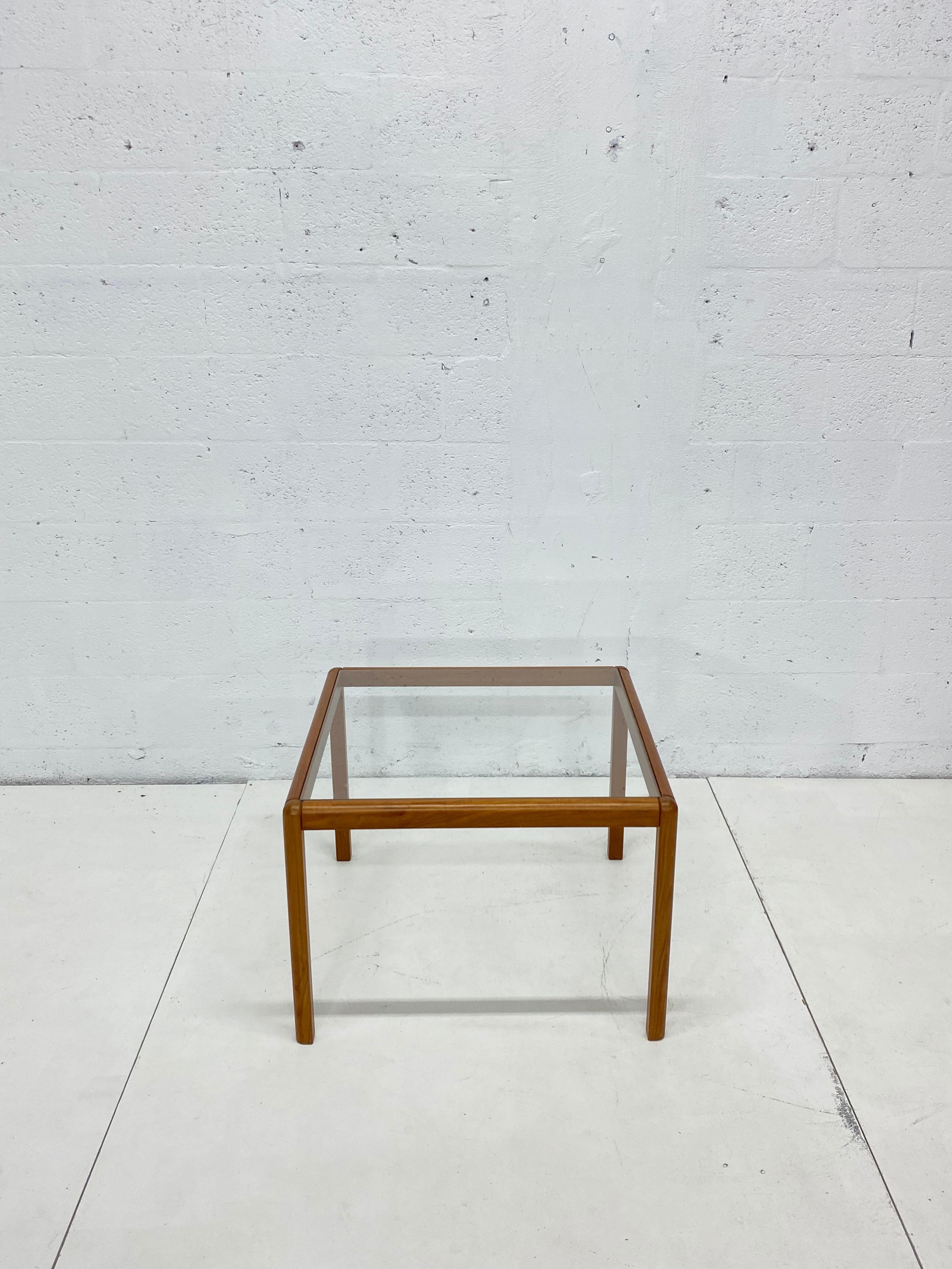 Mid-century Danish modern wood frame and glass top side tables from the 1970s. Could also be used as coffee or cocktail tables.