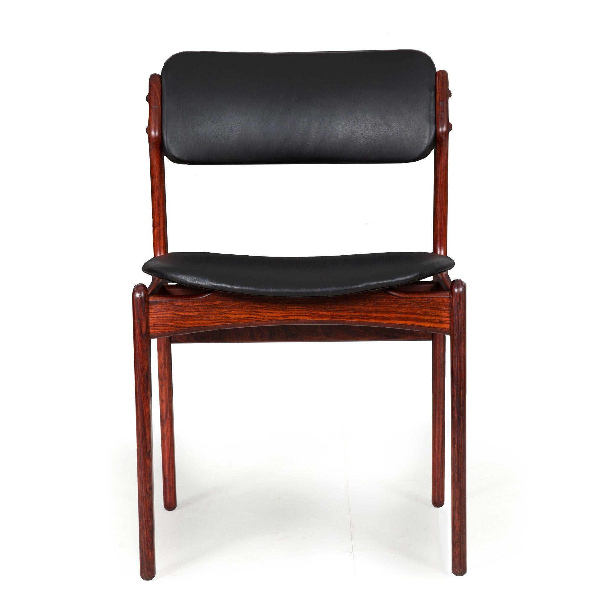 DANISH MODERN ROSEWOOD & BLACK LEATHER MODEL OD-49 SIDE CHAIR
By Erik Buch for O.D. Møbler  Denmark, circa 1980s
Item # 202WNP13P 

An iconic chair to the period, Erik Buch's 