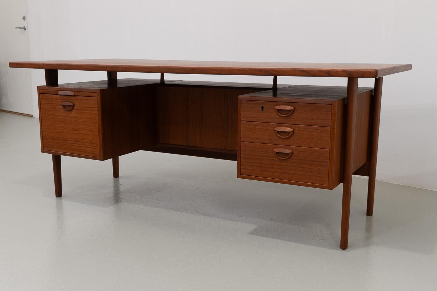 Mid-20th Century Danish Modern Model 58 Long Teak Desk by Kai Kristiansen by FM Møbler, 1960s.