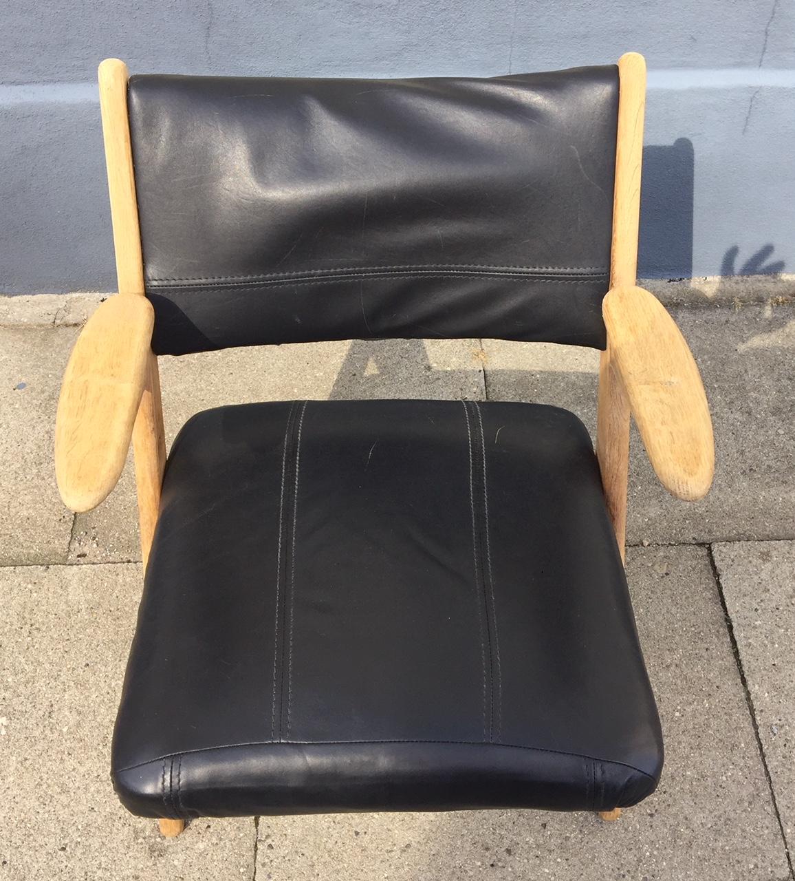 Mid-20th Century Danish Modern Oak and Black Leather Lounge Chair by Arne Hovmand Olsen, 1960s For Sale