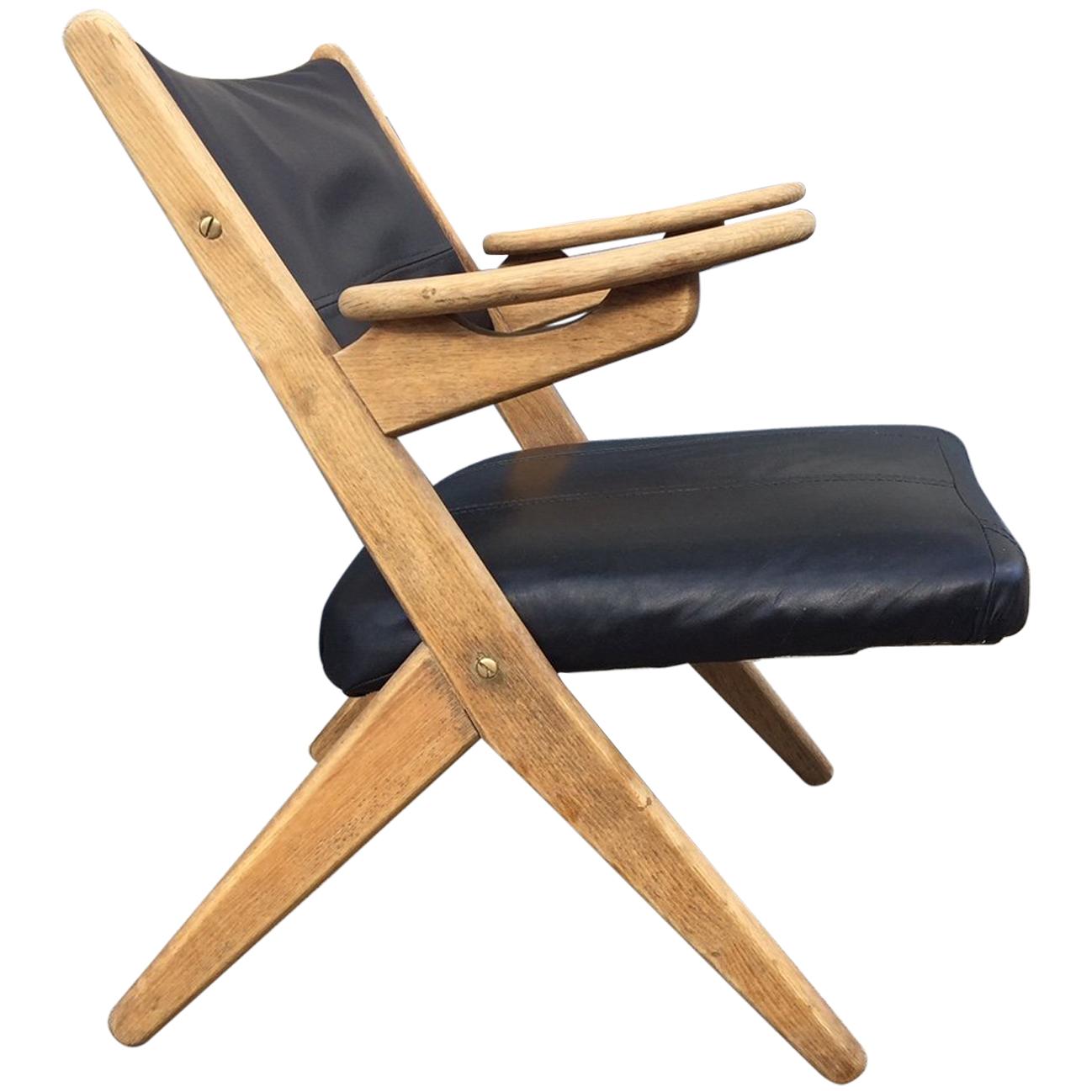 Danish Modern Oak and Black Leather Lounge Chair by Arne Hovmand Olsen, 1960s For Sale