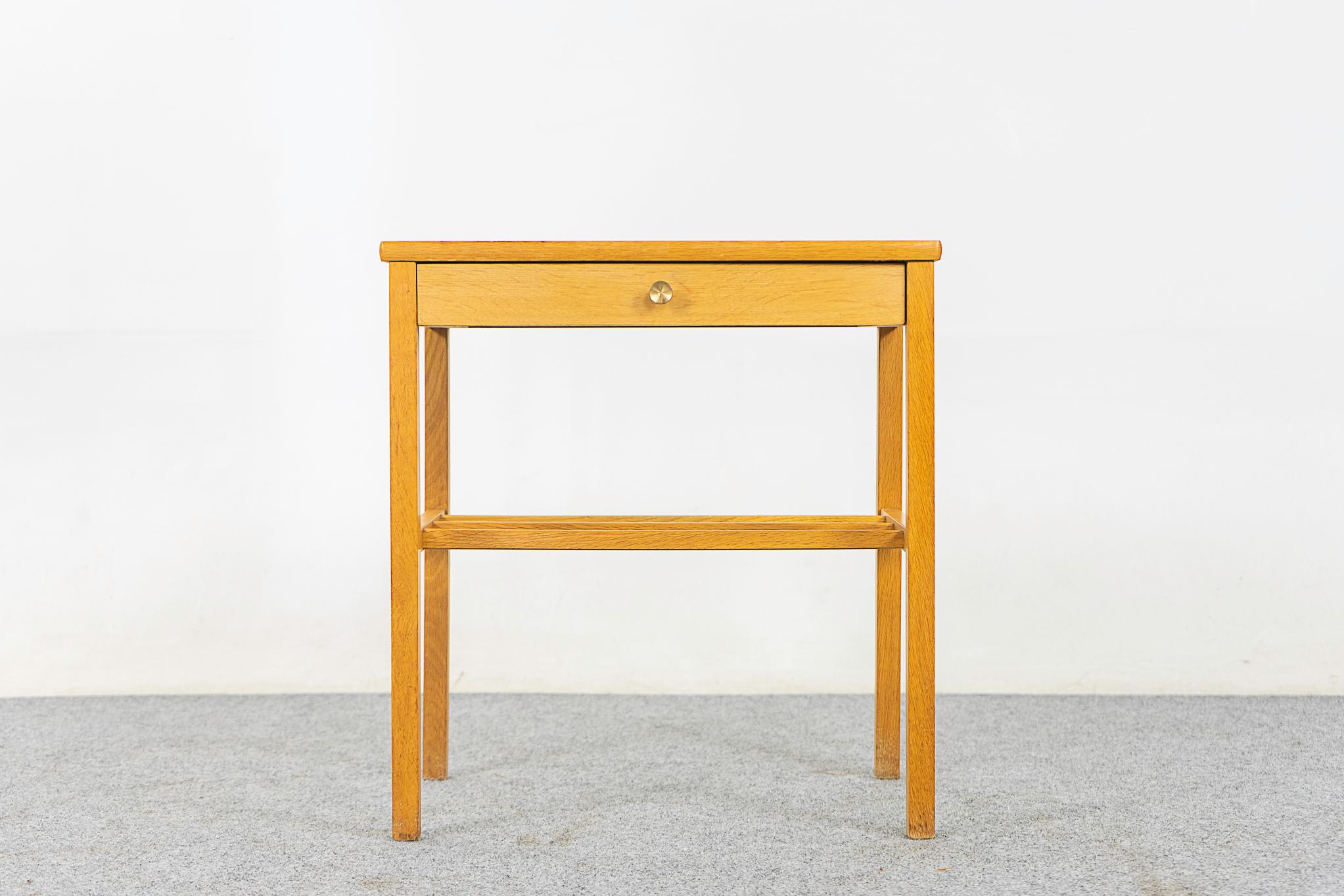 Oak Danish bedside table, circa 1960's. Single drawer for small items, slatted shelf is perfect for your favourite book!

Please inquire for remote and international shipping rates.
