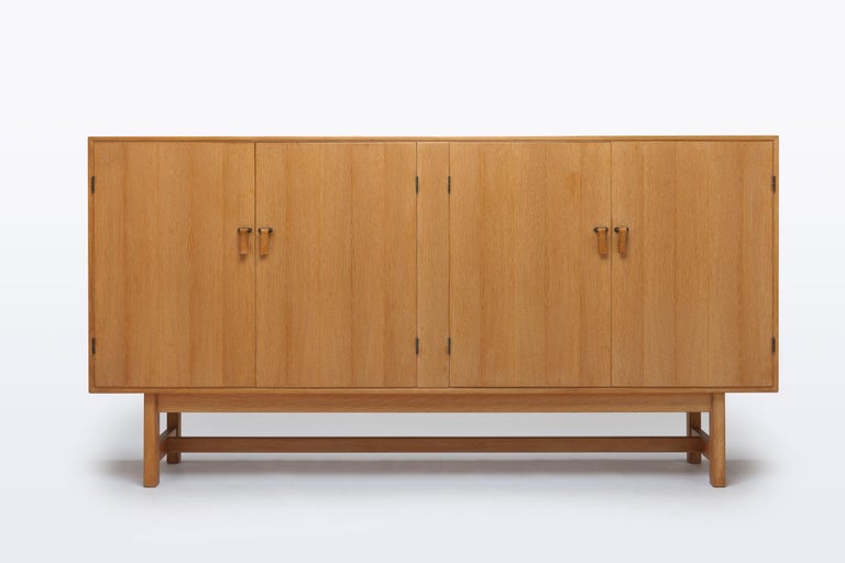 Danish Modern Oak Brass And Leather Cabinet By Kurt Ostervig For