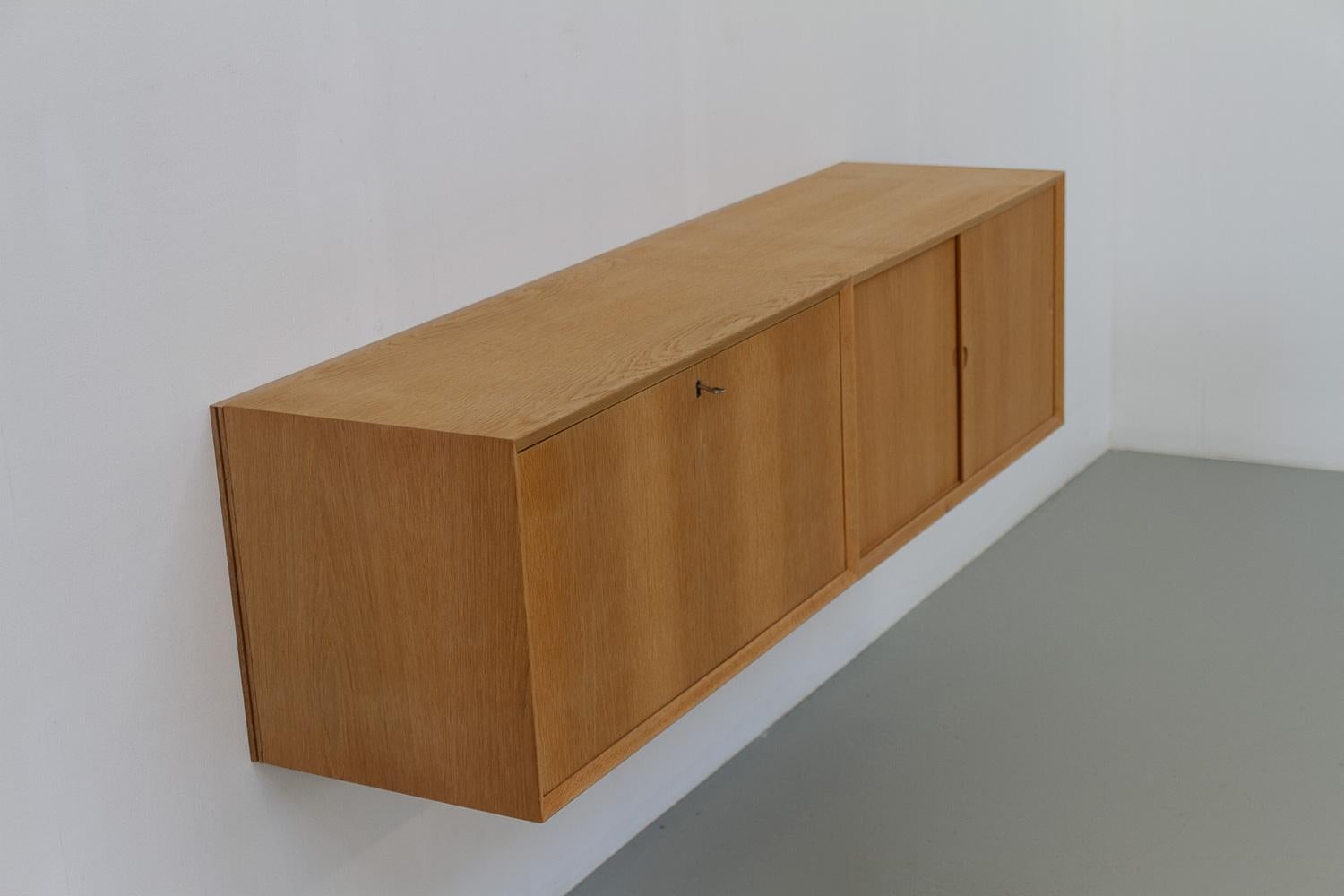 Mid-20th Century Danish Modern Oak Floating Sideboard by Poul Cadovius for Cado 1960s. For Sale