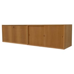 Buffet flottant danois moderne en chêne de Poul Cadovius pour Cado, années 1960.