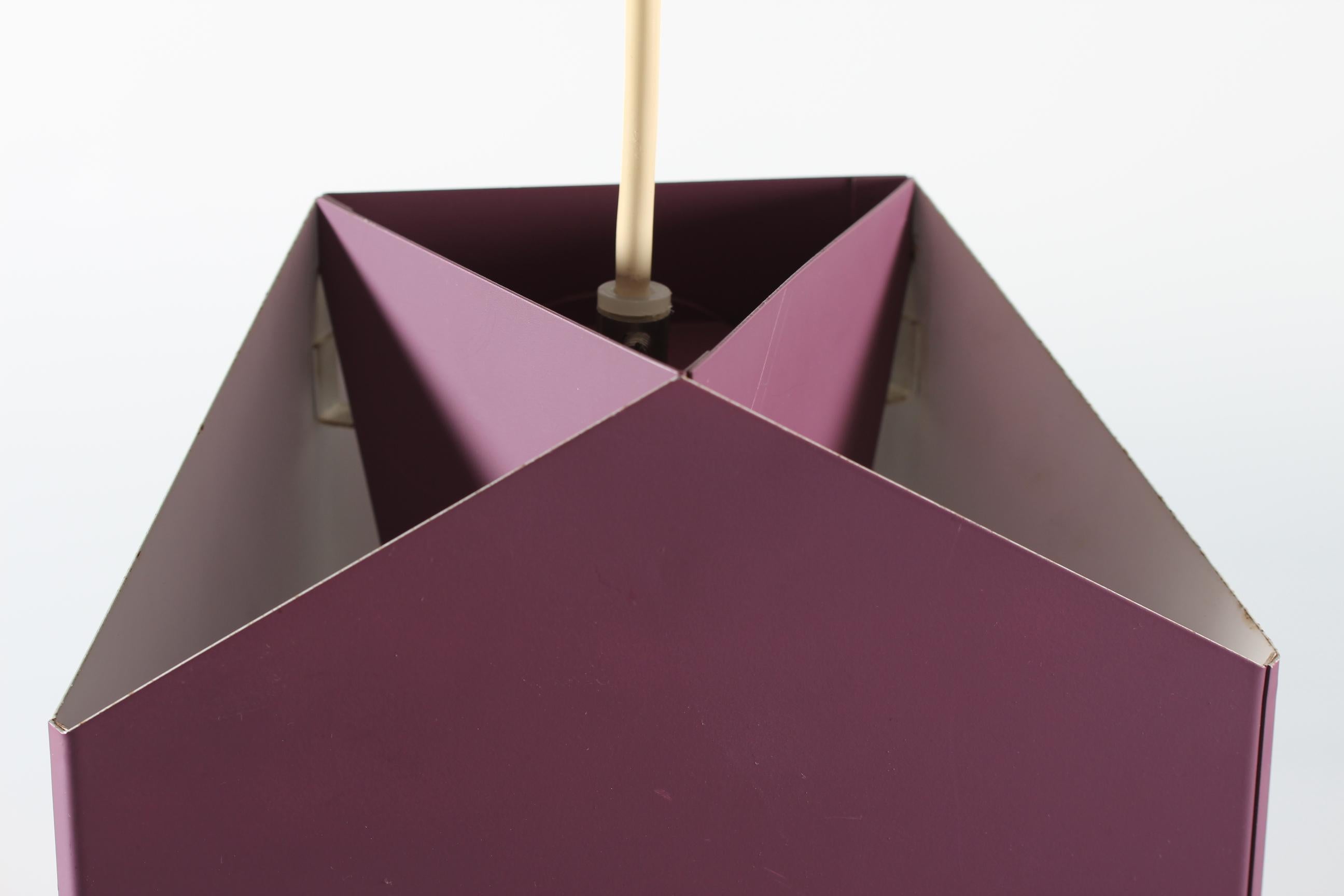 Vintage Seks-Tre-pendel/ceiling lamp made of metal with purple lacquer. 
It's designed by Danish Ole Panton (1938-), a brother to Verner Panton and produced by the Danish lamp manufacturer Lyfa in Copenhagen in the 1960s.

Nice vintage condition