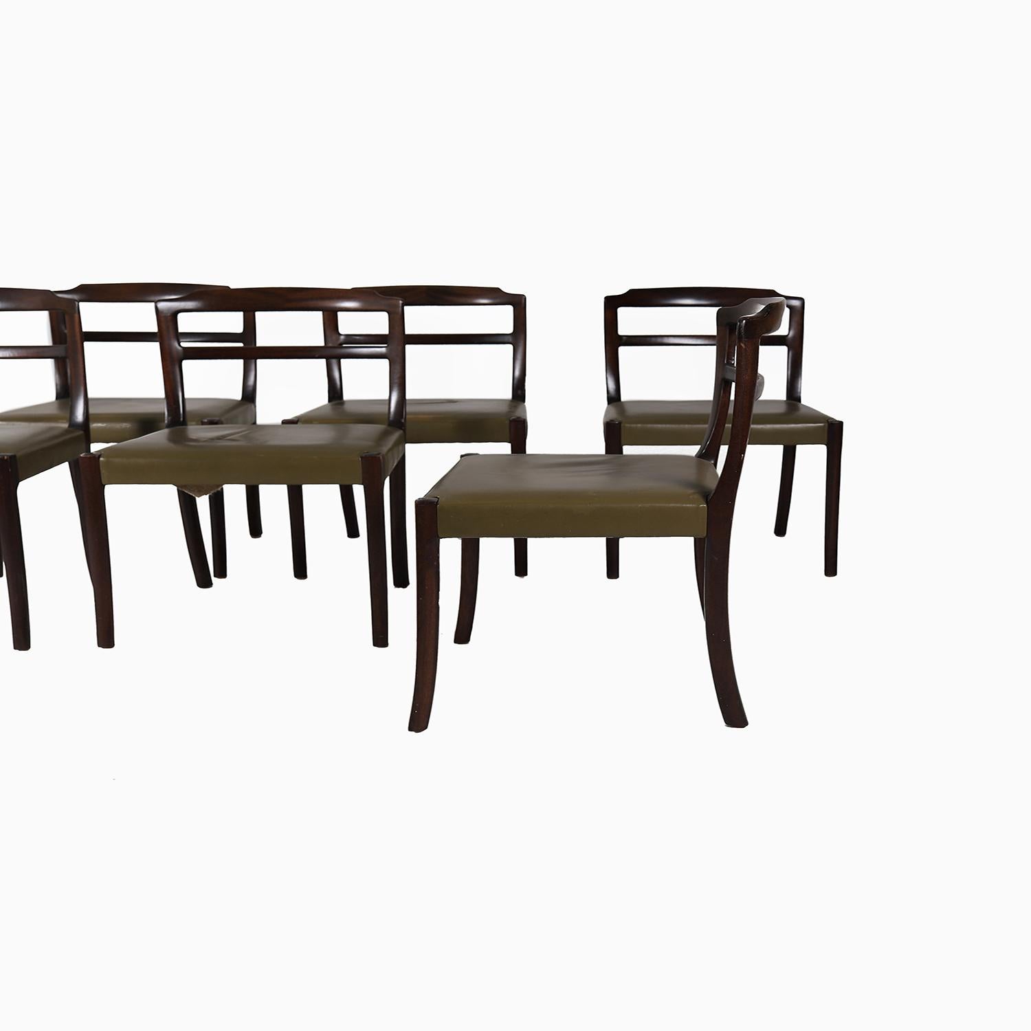 An elegant design by Danish modern designer Ole Wanscher. An elegant design constructed in a rich dark mahogany. beautiful from all angles. Please inquire about upholstery options.

Professional, skilled furniture restoration is an integral part of