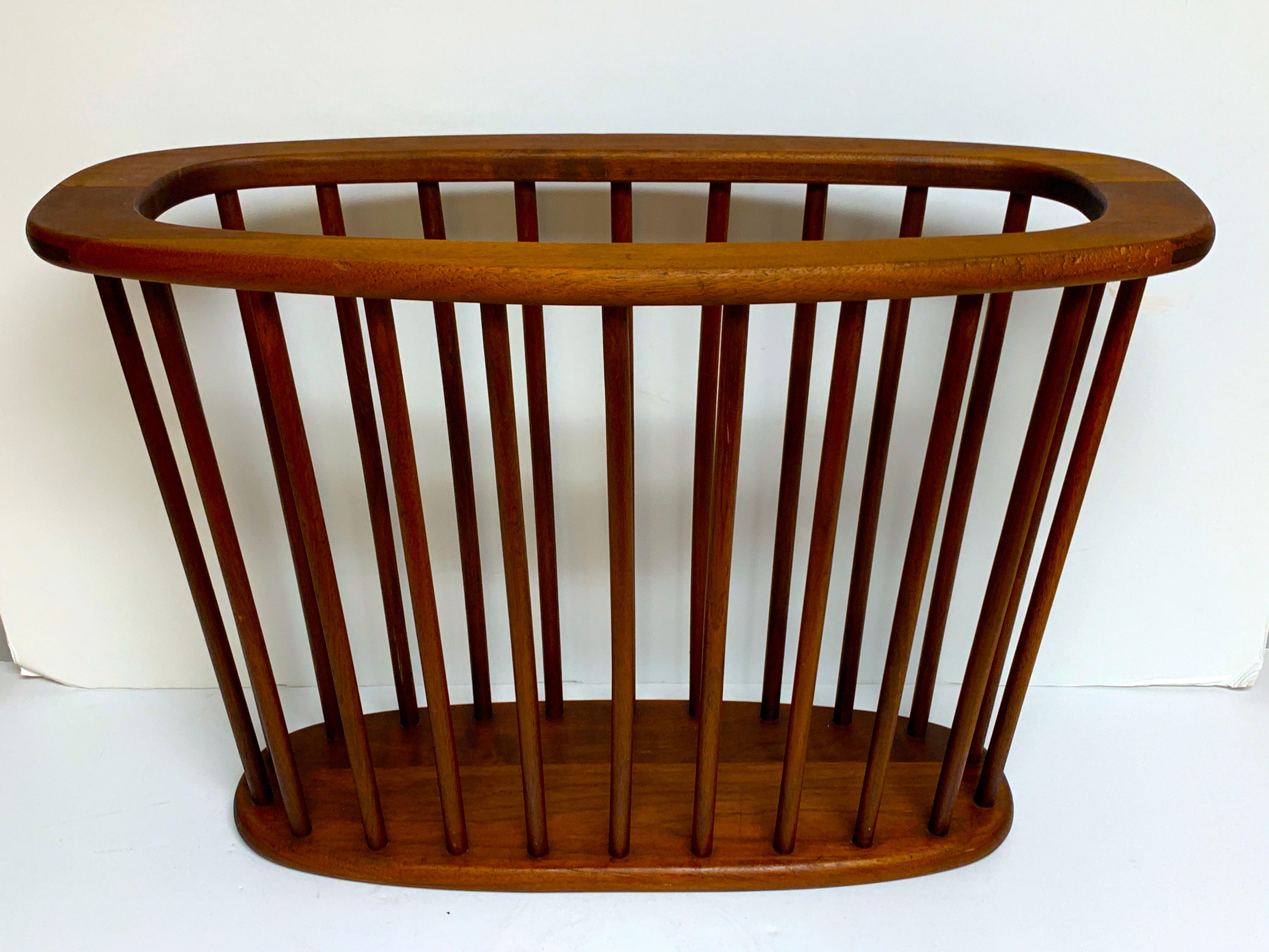 Danish modern oval spindle teak magazine rack, better than most with dovetailed construction. Ready to place.