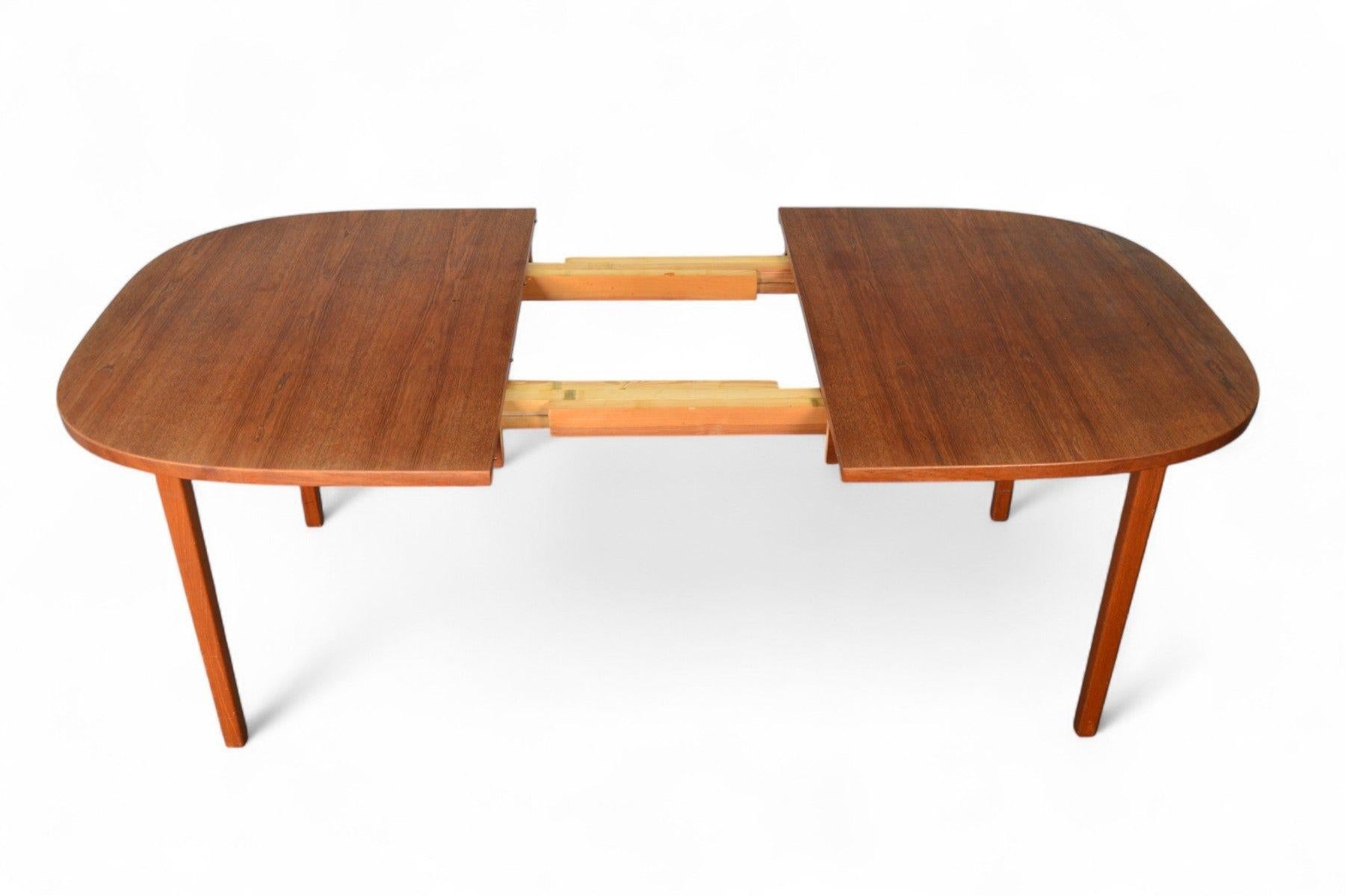 20th Century Danish Modern Oval Teak Dining Table With Two Leaves For Sale