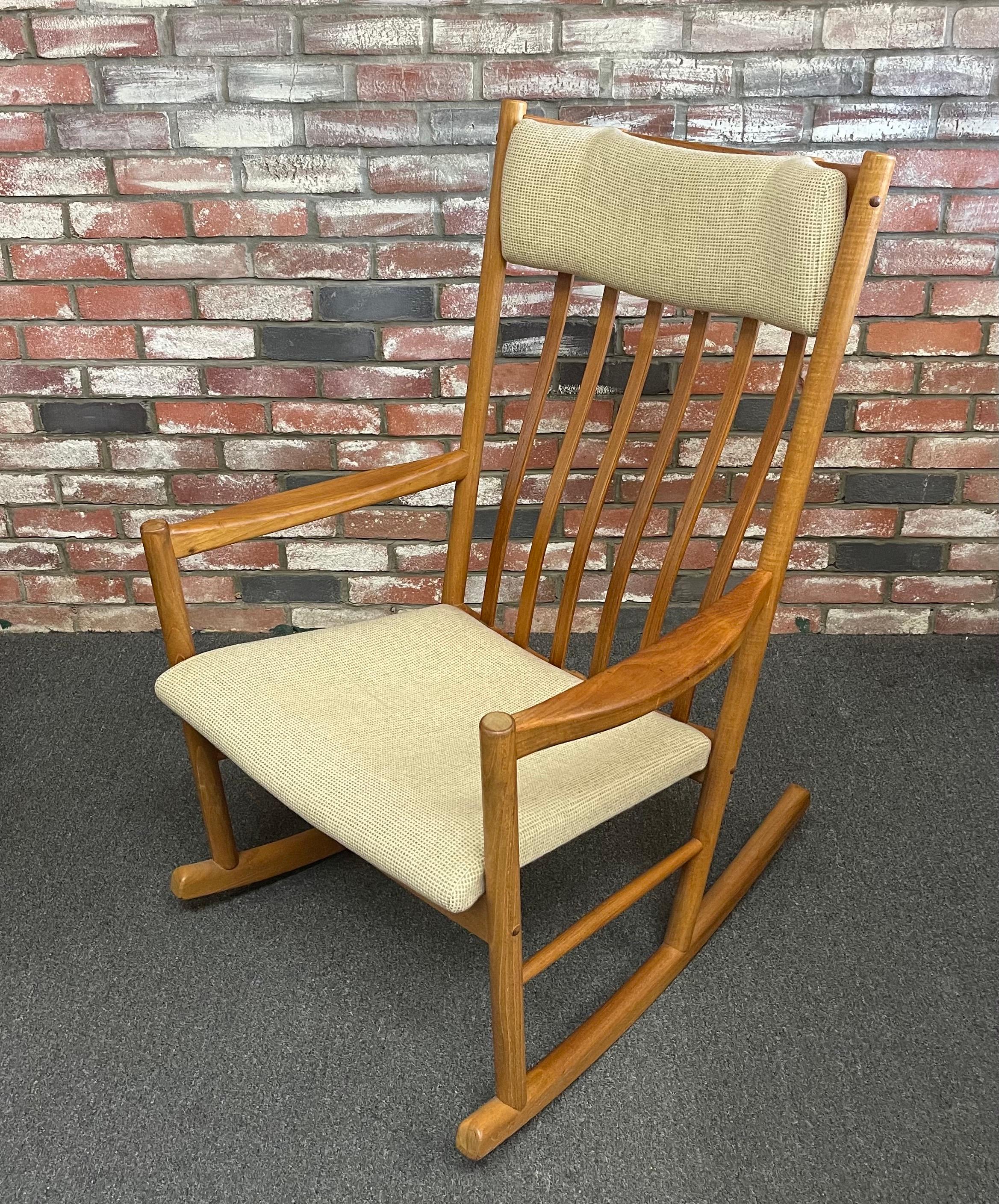 Danish Modern oversized teak rocking chair / rocker by Hans Wegner for Tarm Stole, circa 1970s This chair is even more impressive in person. The large proportions of this design make a statement but it does not overwhelm the room. The beautiful warm
