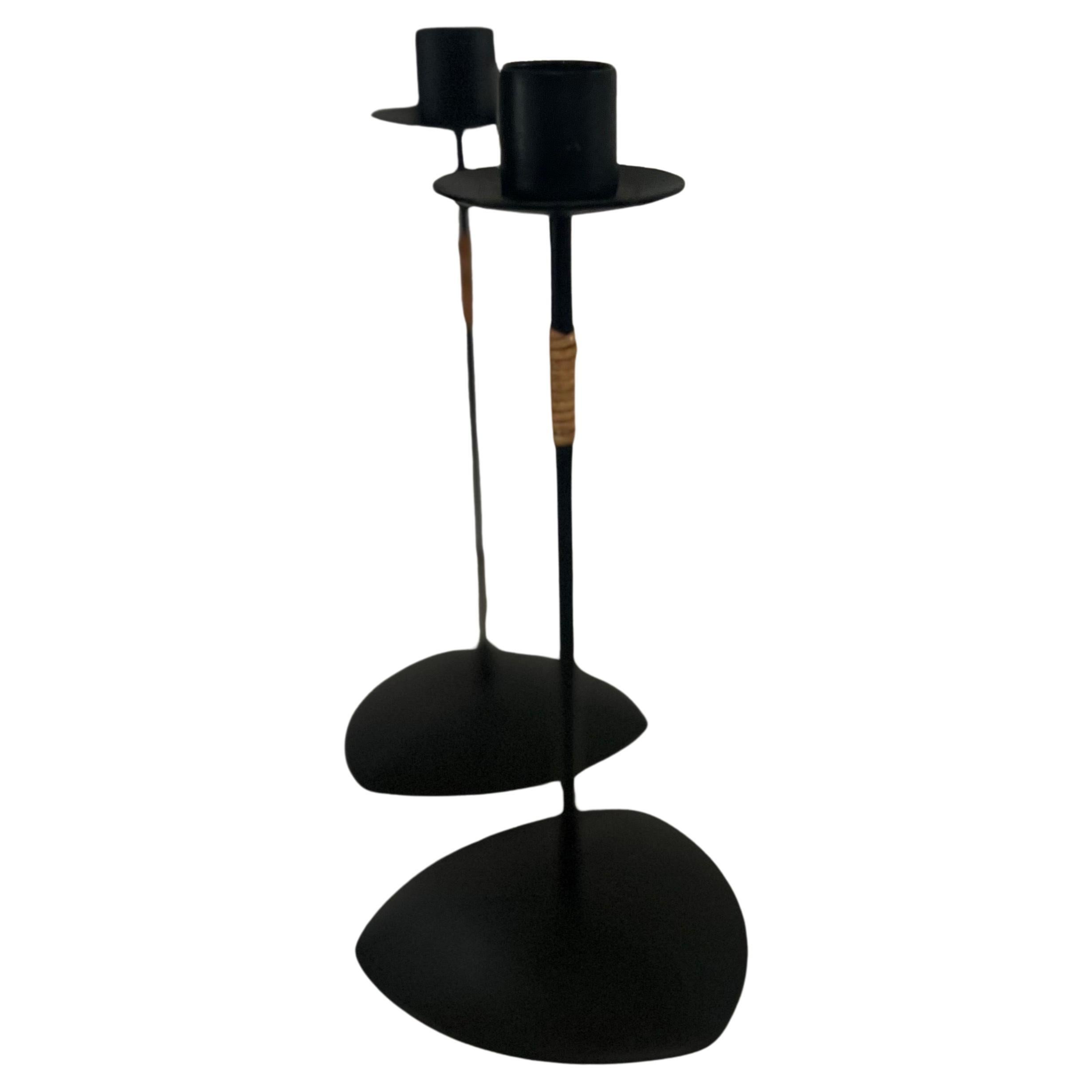 Beautiful simple elegant design by Laurids Lonborg, pair of black enameled candle holders circa 1950s with wrapped cane great condition.