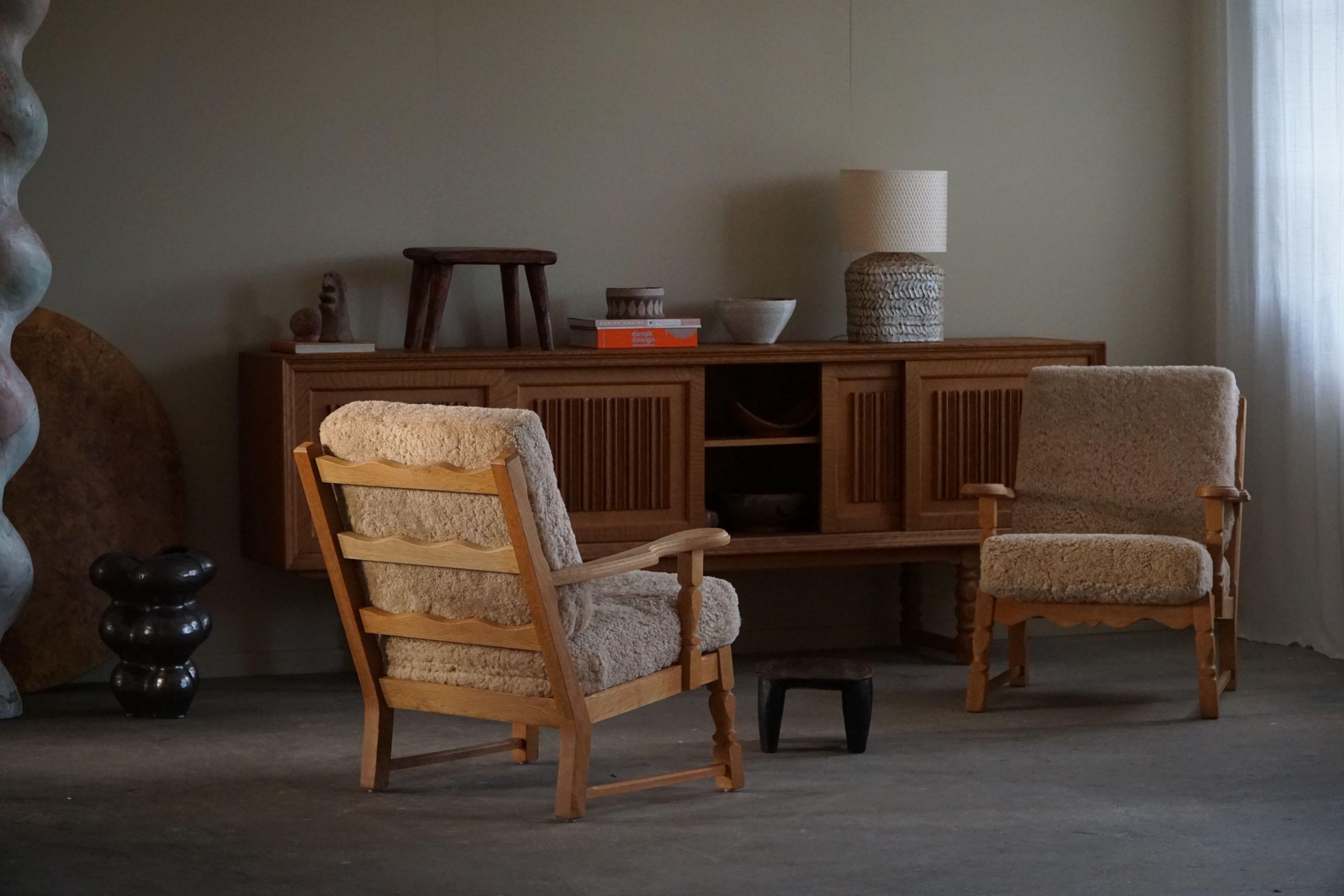 20th Century Danish Modern, Pair of Lounge Chairs in Oak & Lambswool, Henning Kjærnulf, 1960s