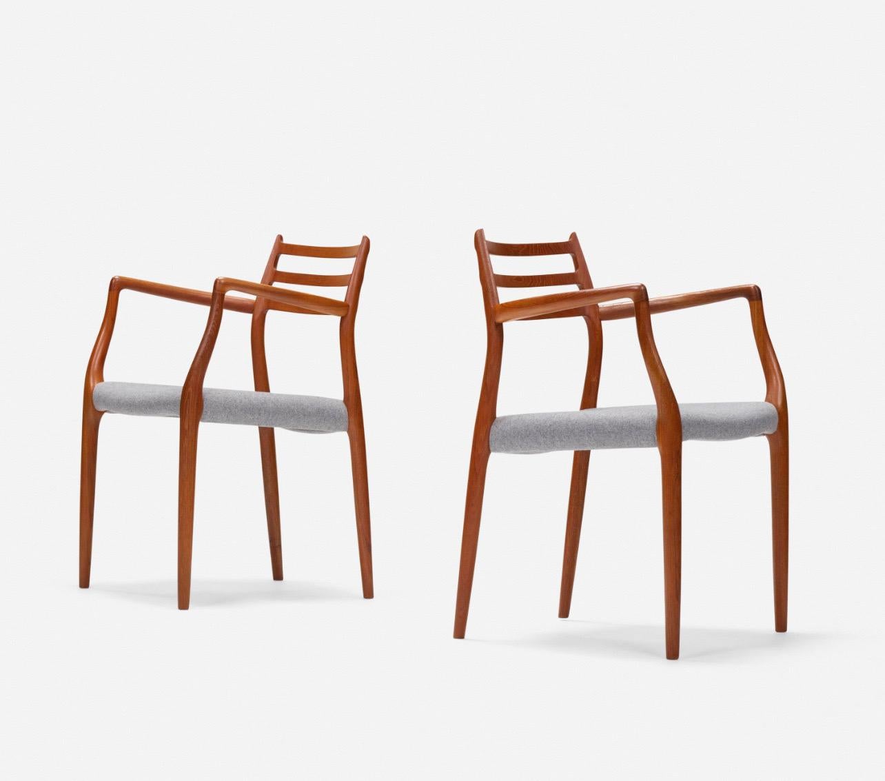 Beautiful elegant pair of armchairs model 62 nice solid teak new fabric , great condition solid and sturdy by master Niels Moller.