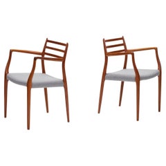 Danish Modern Pair of Rare Armchairs in teak by Niels Moller Model 62