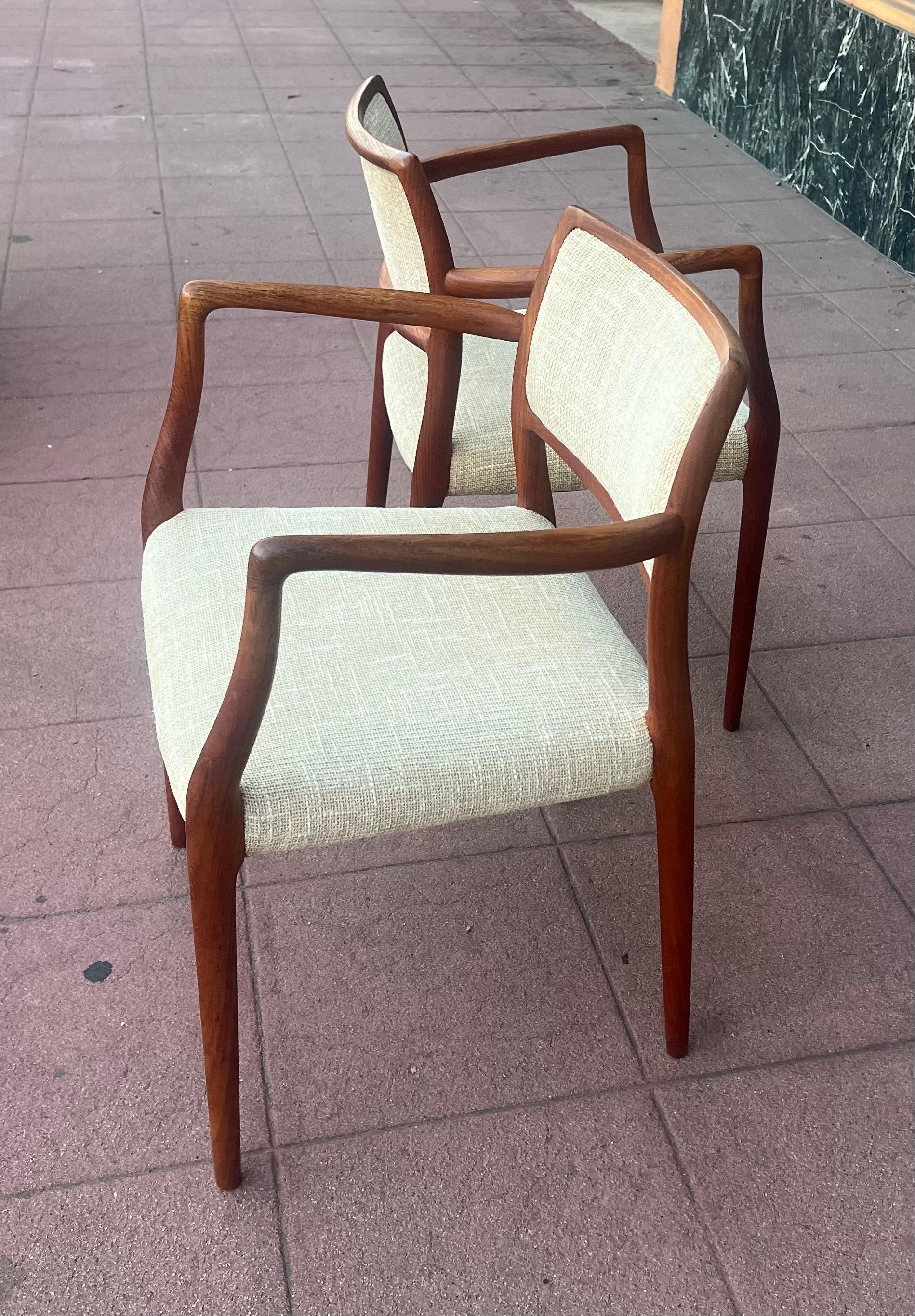 Beautiful elegant pair of armchairs model 65 nice solid teak new Knoll fabric , great condition solid and sturdy by master Niels Moller.