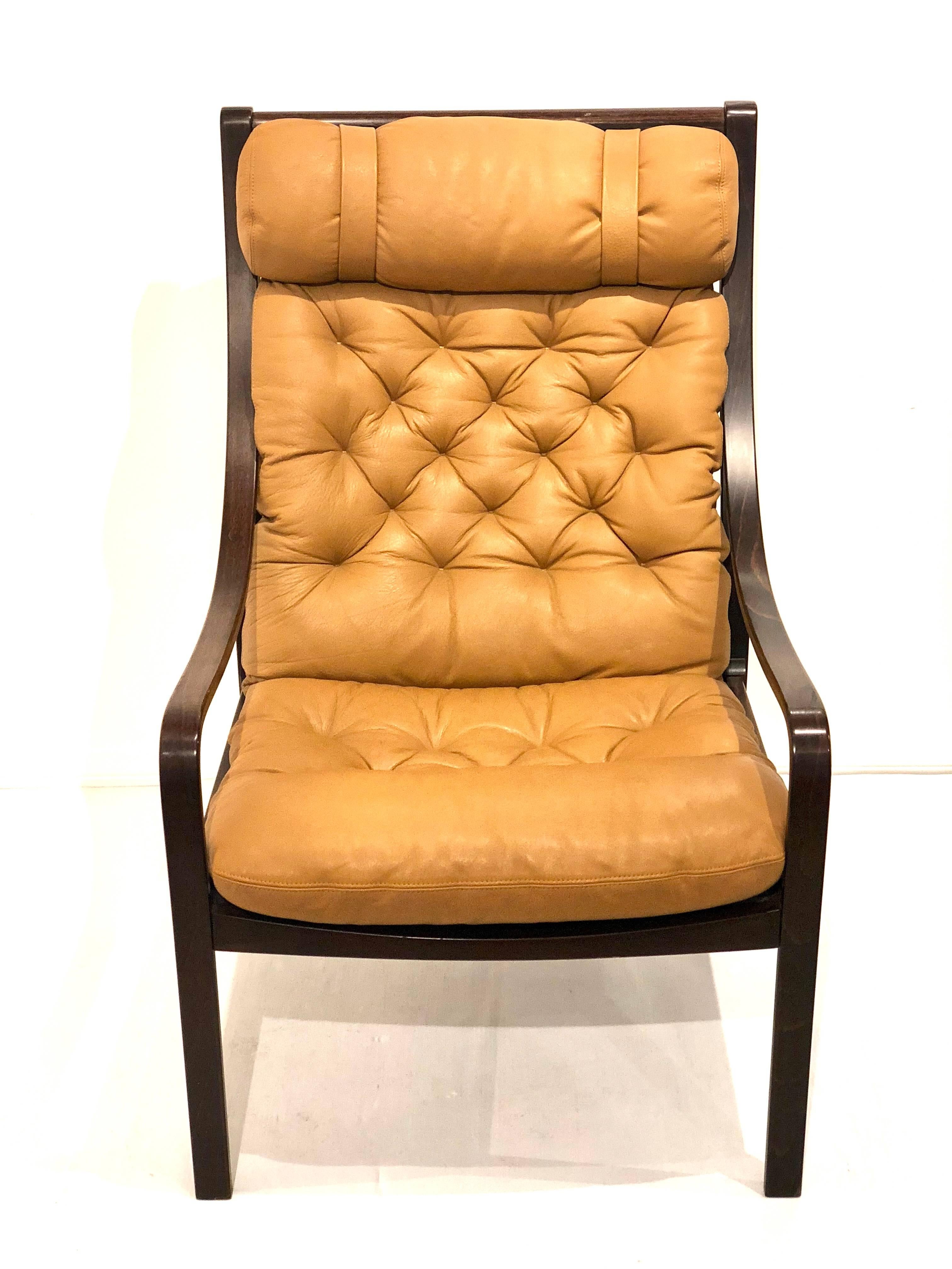 Elegant beautiful bent wood rosewood armchairs with tufted leather seats, in great condition light and comfy chairs, circa 1960s in great original condition.