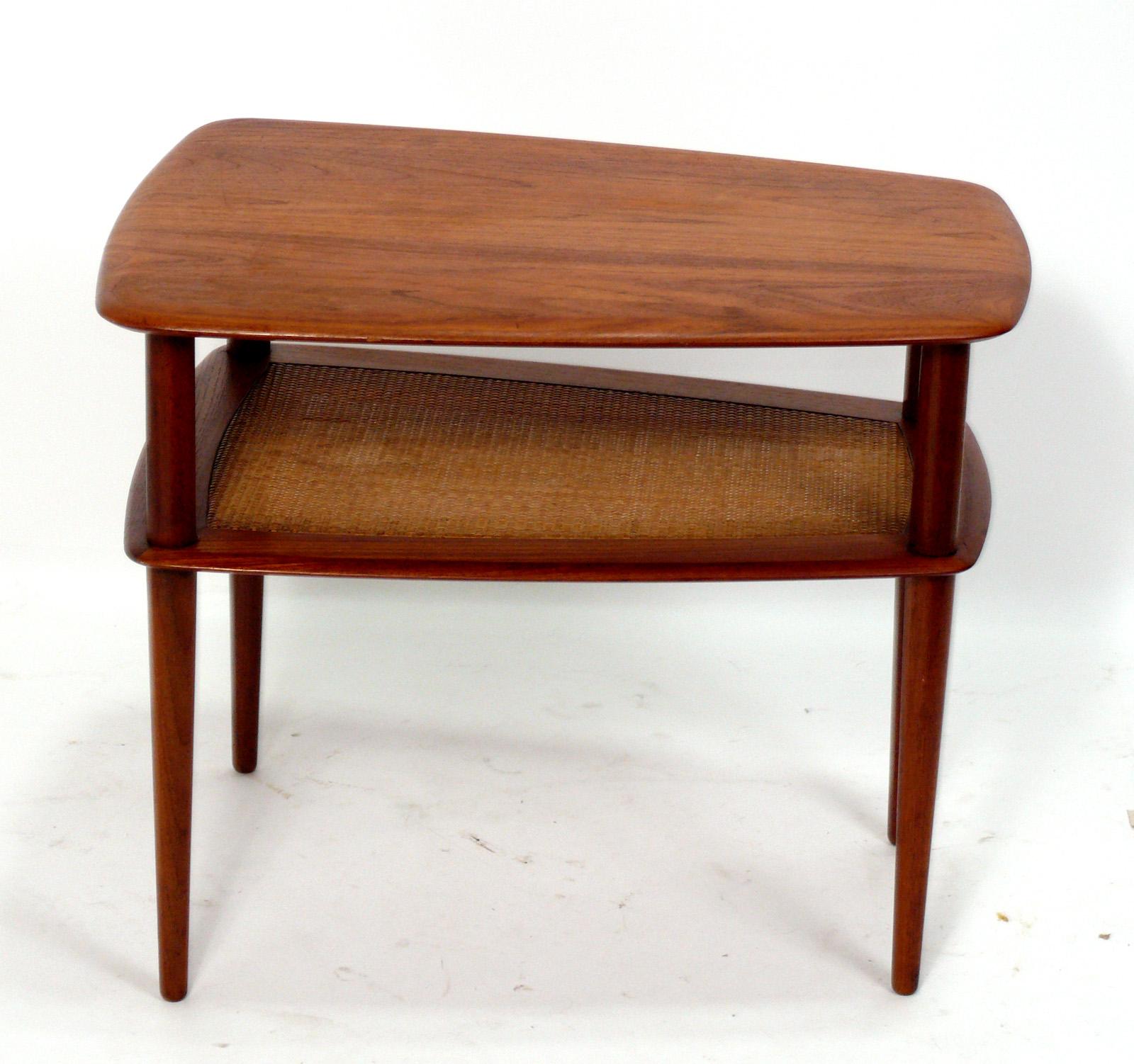Danish Modern teak and cane end or side table, designed by Peter Hvidt for France and Sons, Denmark, circa 1960s. It is a versatile size and can be used as an end or side table, or as a night stand. It has been cleaned and Danish oiled.