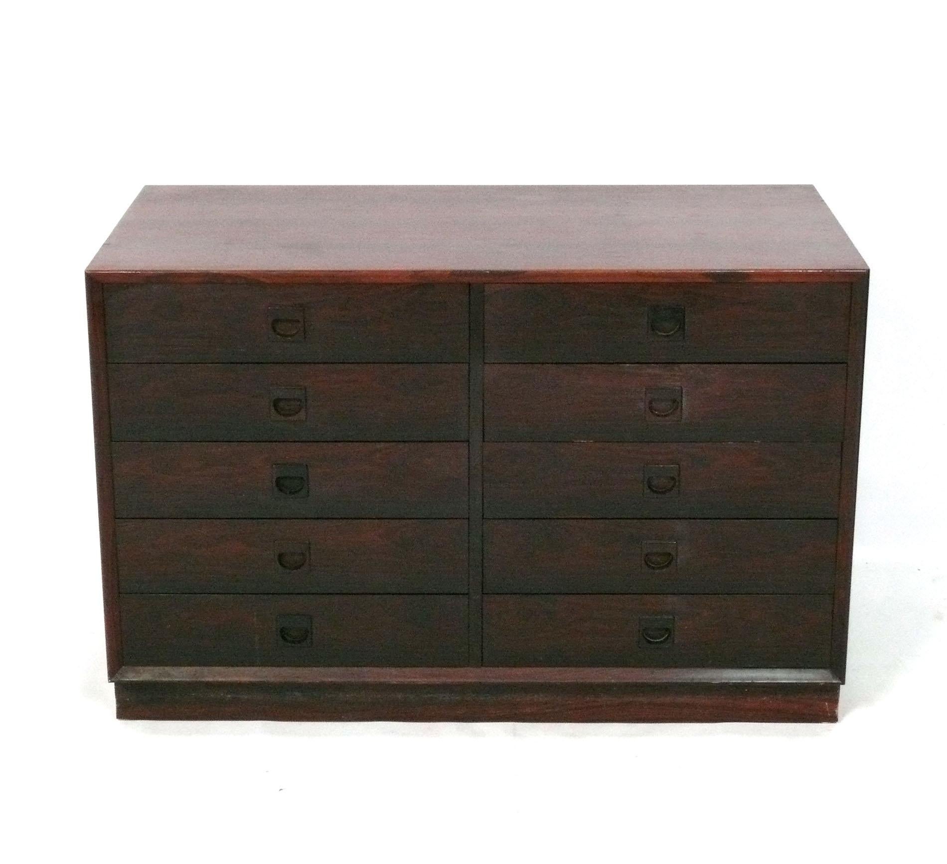 Danish Modern Petite Rosewood Chest or Nightstand, in the style of Arne Wahl Iversen, Denmark, circa 1960s. It offers a lot of storage in a small footprint with ten drawers to keep you organized. It has been cleaned and Danish oiled. 