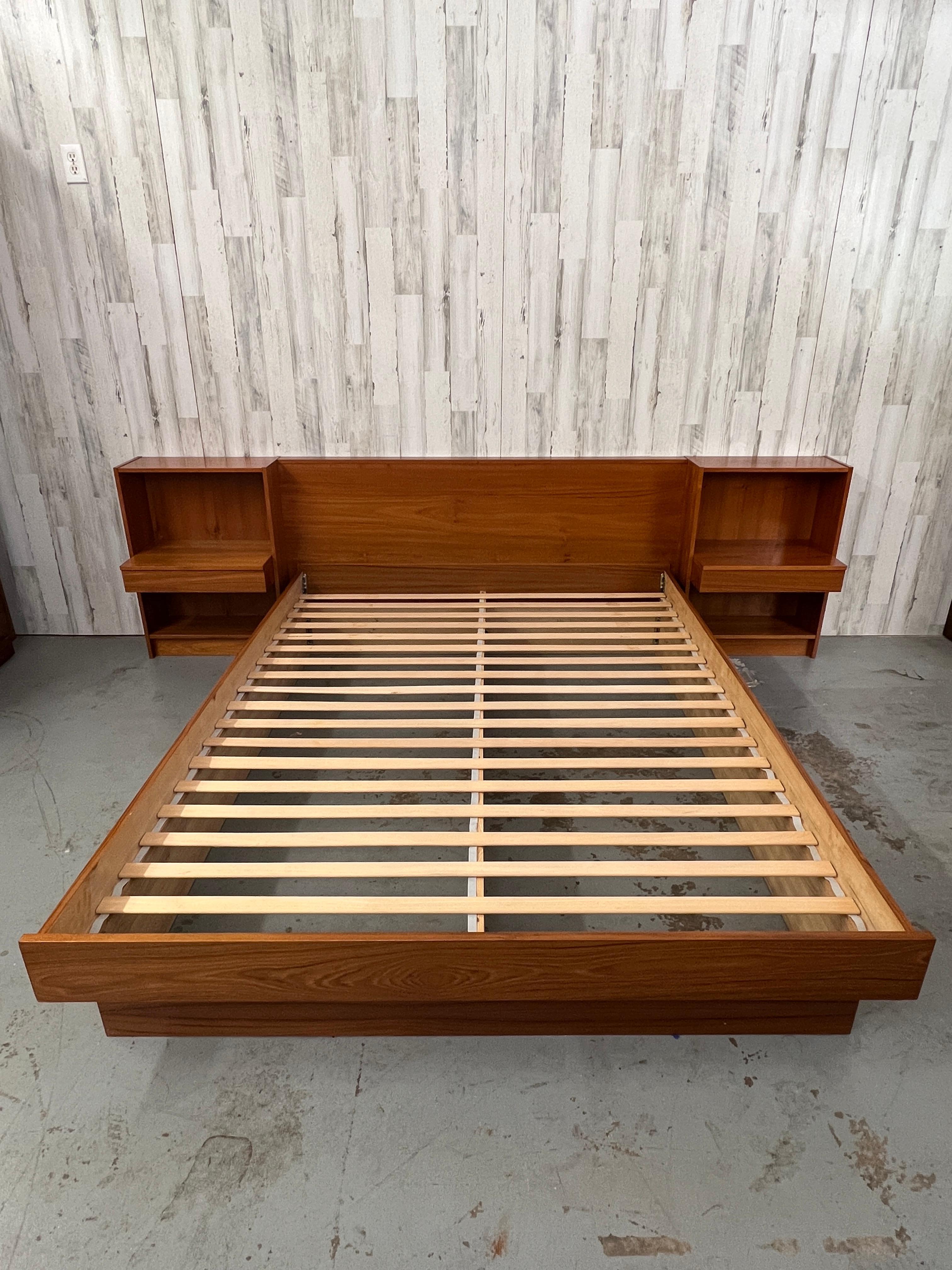 Danish Platform bed & nightstands- Queen Size. The nightstands bolt to the headboard for a very sturdy unit.

Bed frame only: 81.25 L x 61.75 W
Each nightstand: 23.25 L x 15 D x 31.75 H
Headboard Length: 65.5
Height of footboard 14.75.