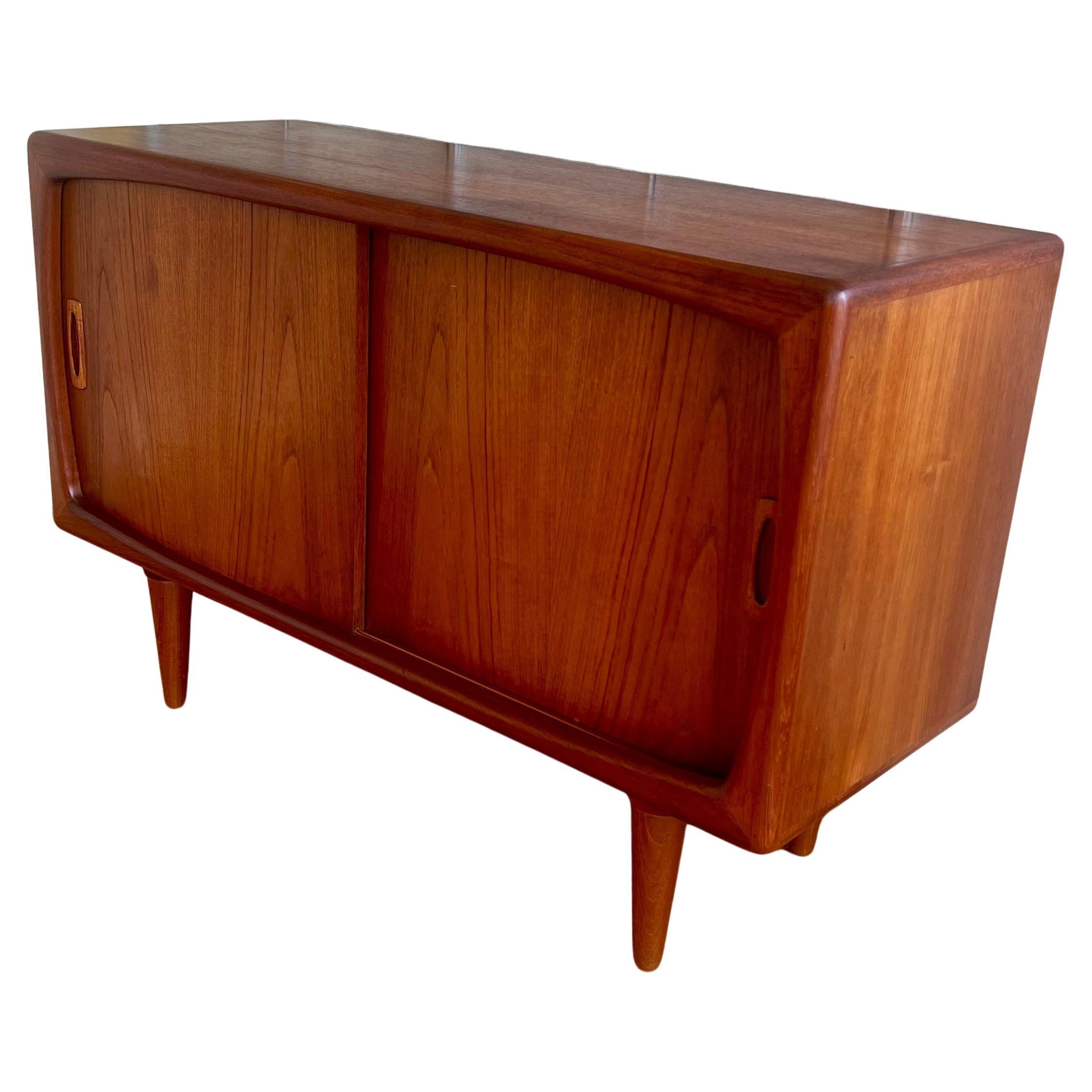 Beautiful versatile petite teak credenza with double doot by H P Hansen Denmark attributed to Arne Vodder , circa 1950's nice clean condition original finish and patina , we have cleaned and oiled stamped , beautiful solid sturdy teak legs great