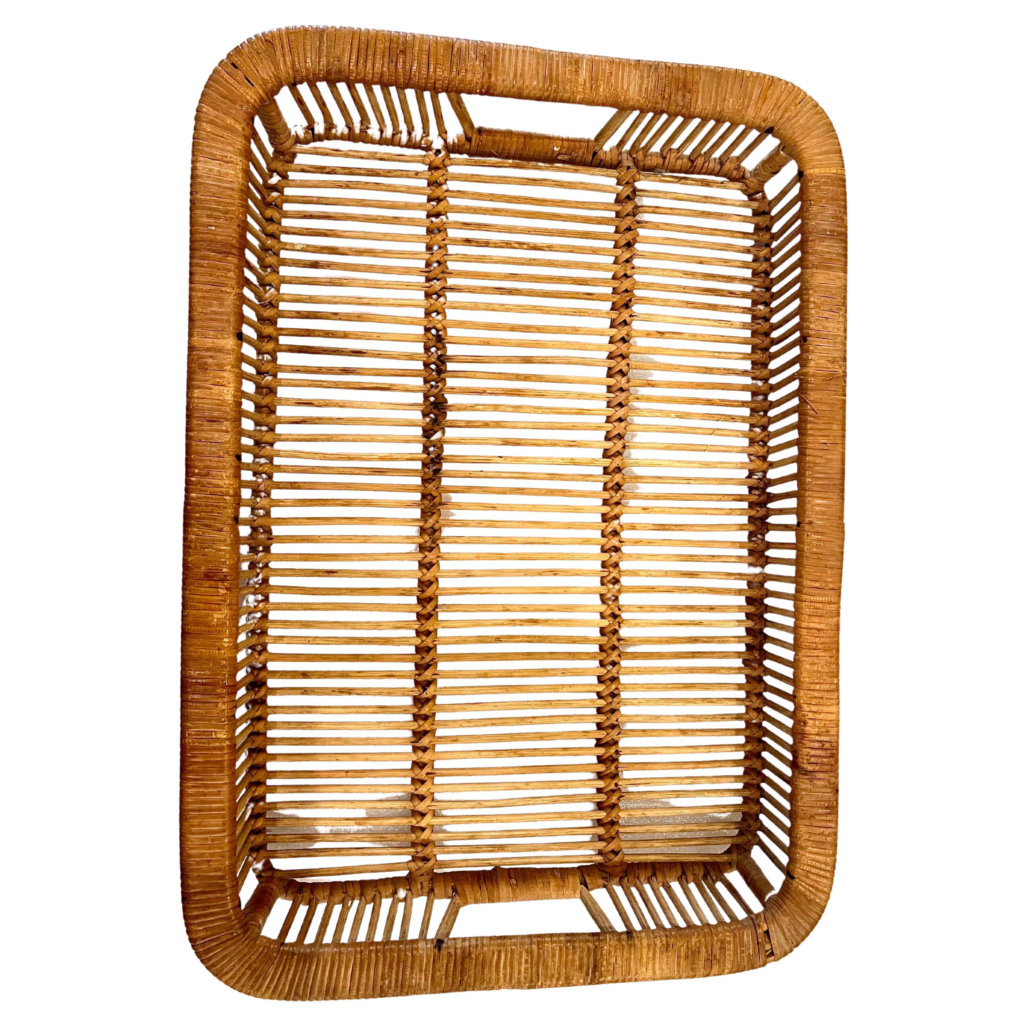 Danish Modern Rattan tray was designed and made by Artek in Finland during the 1960s. Hand woven from cane and rattan. Good vintage condition with signs of age-related wear and patina.

these beautifully crafted trays were designed, produced, and