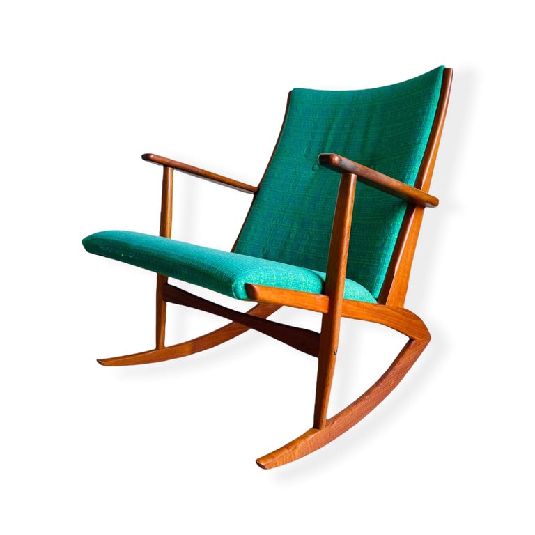 Danish teak rocking chair designer by Holgar Georg Jensen* part of the Kubis collection for Tønder Møbelværk Denmark, 1958. Original upholstery very clean. Stylish boomerang design. This chair is in good vintage condition with normal wear consistent