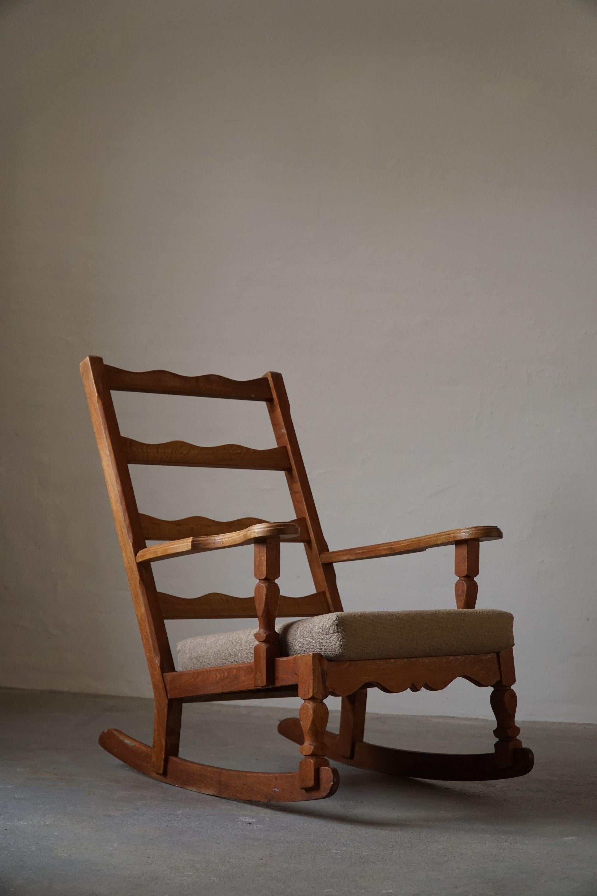 Danish Modern Rocking Chair in Solid Oak, Reupholstered, Henning Kjærnulf, 1950s 4