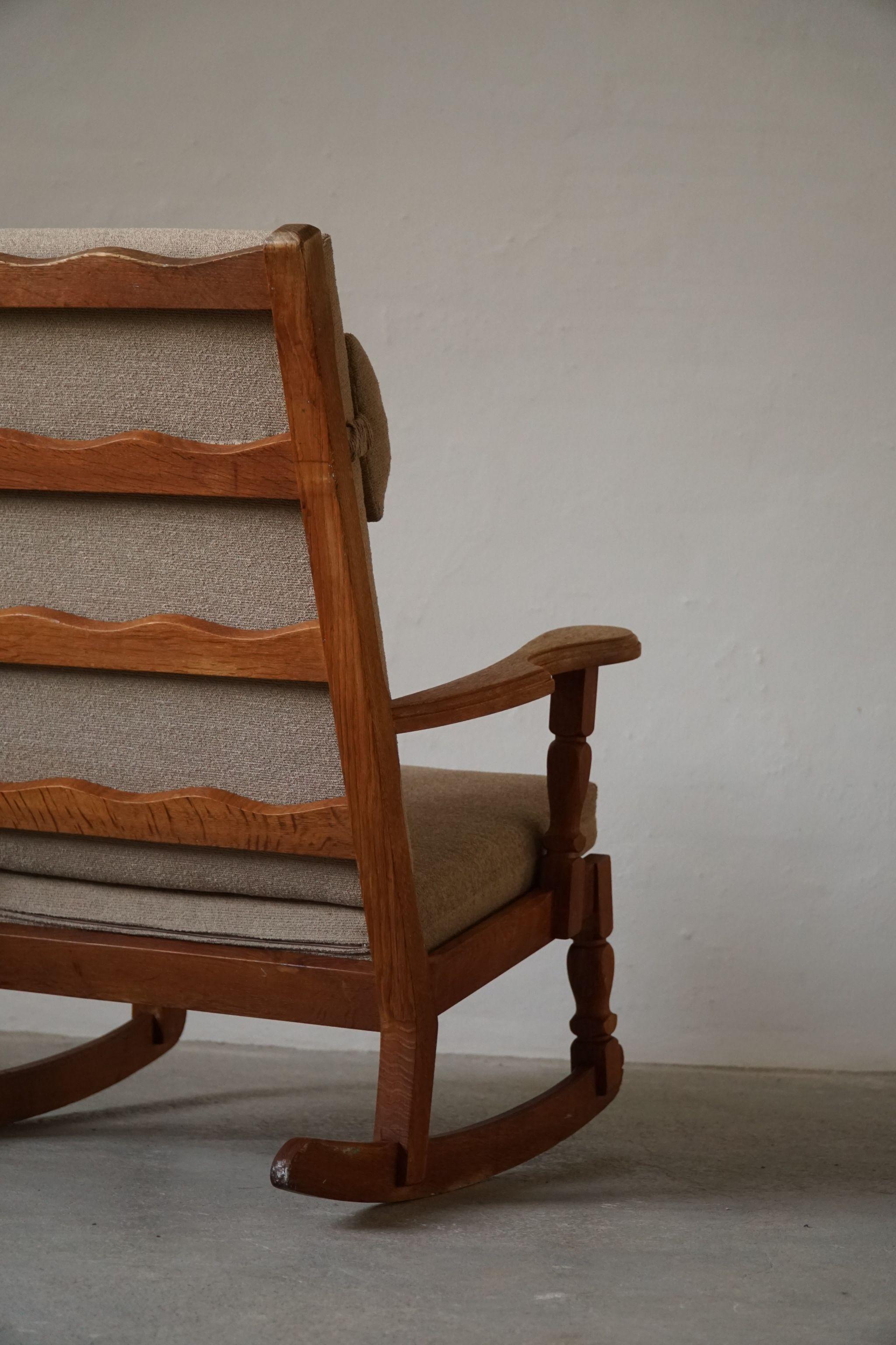 Wool Danish Modern Rocking Chair in Solid Oak, Reupholstered, Henning Kjærnulf, 1950s