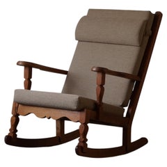 Vintage Danish Modern Rocking Chair in Solid Oak, Reupholstered, Henning Kjærnulf, 1950s